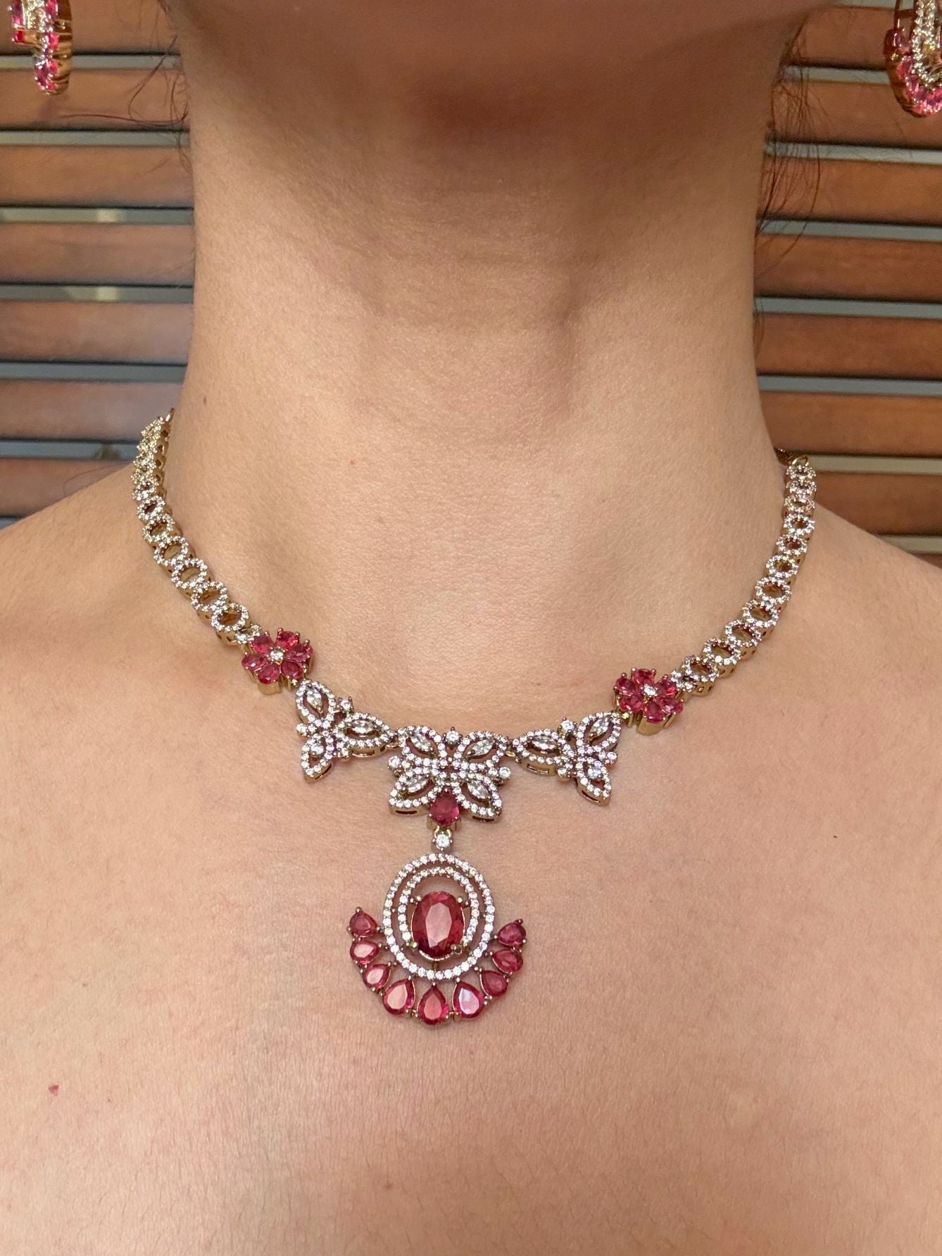 Buy Albeli Delicate Look Pendant Style Antique AD Necklace In Red online in India. Shop from an exclusive range of jewellery, AD necklace, Kundan necklace for weddings. -front