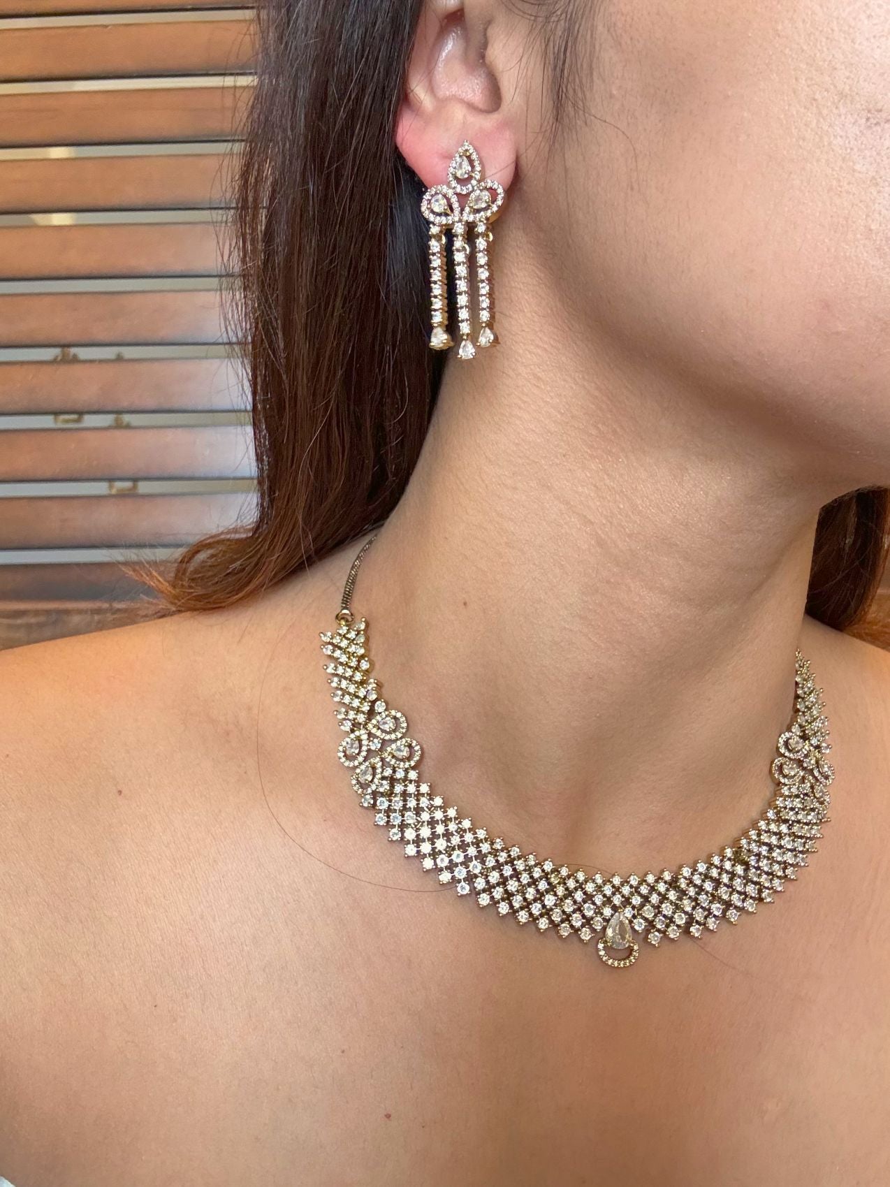 Buy Ashna Antique Polish AD Necklace online in India. Shop from an exclusive range of CZ jewellery, moissanite jewellery, AD necklace, Kundan necklace for weddings. -side