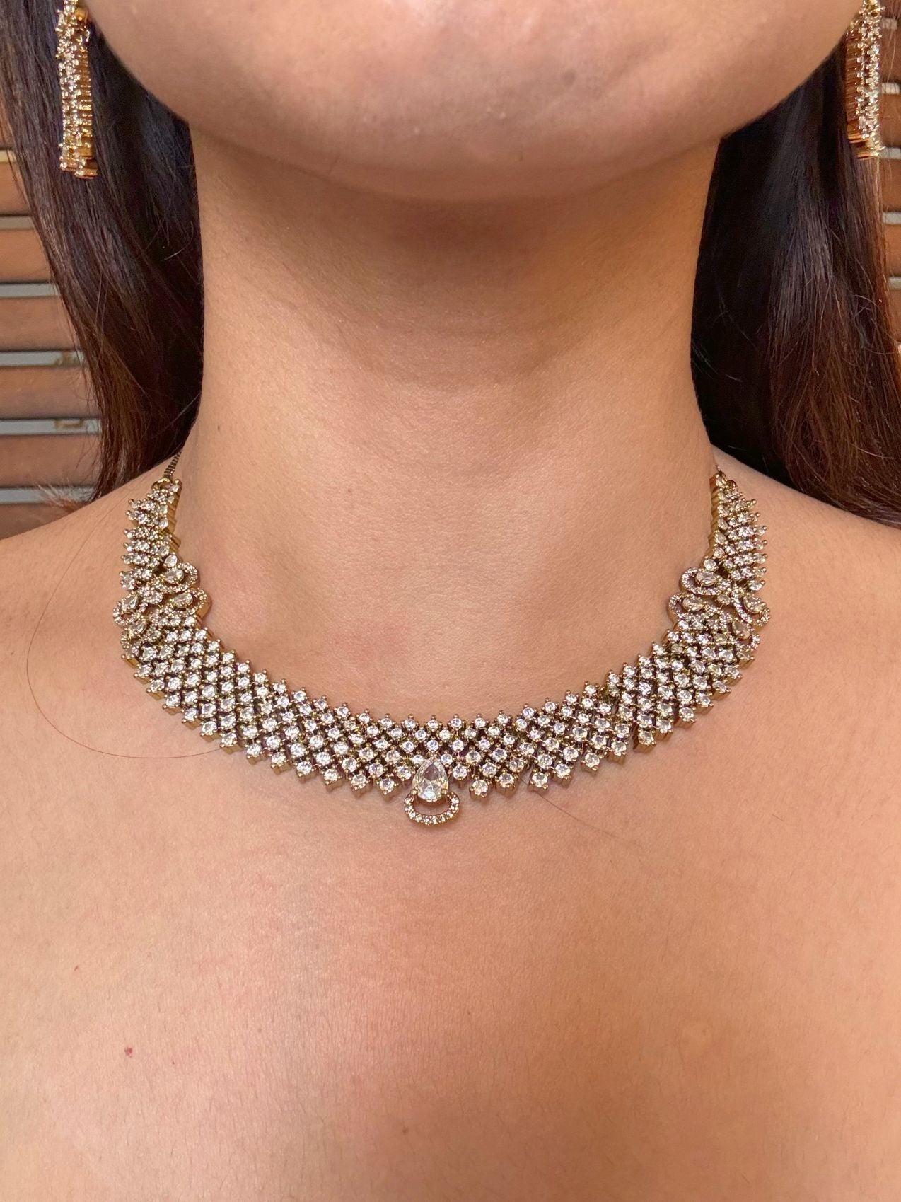 Buy Ashna Antique Polish AD Necklace online in India. Shop from an exclusive range of CZ jewellery, moissanite jewellery, AD necklace, Kundan necklace for weddings. -front