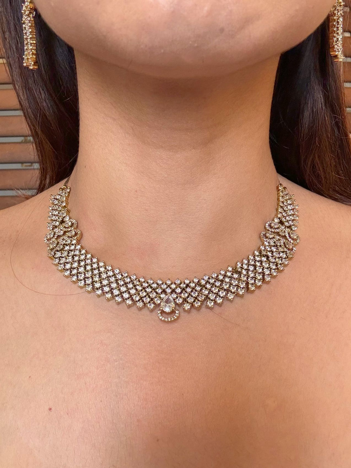 Buy Ashna Antique Polish AD Necklace online in India. Shop from an exclusive range of CZ jewellery, moissanite jewellery, AD necklace, Kundan necklace for weddings. -front