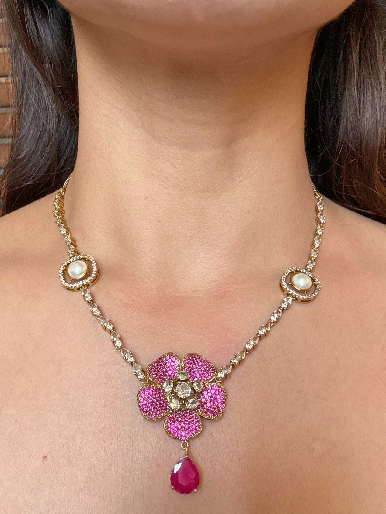 Buy Qaynat Contemporary Nano Setting Pendant Necklace In Pink online in India. Shop from an exclusive range of CZ jewellery, moissanite jewellery, AD necklace, Kundan necklace for weddings. -front