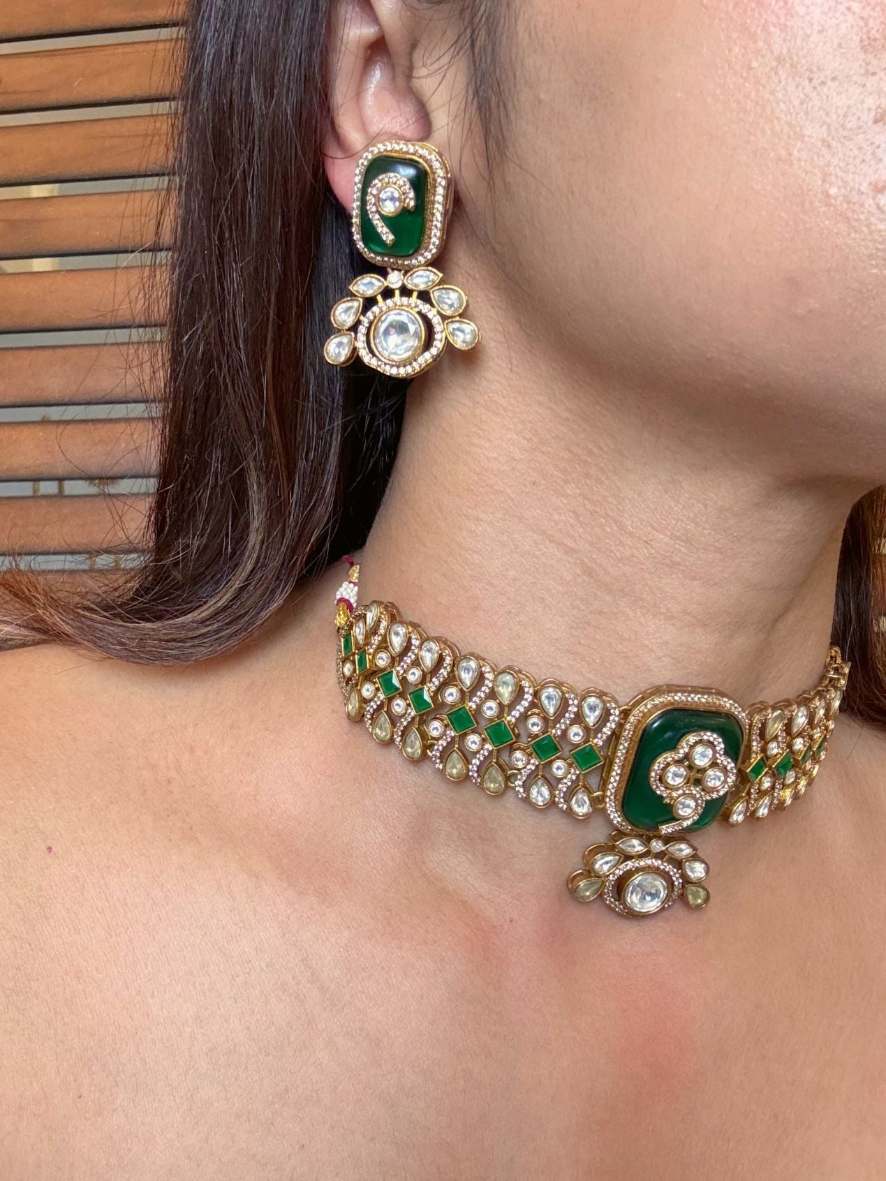 Buy Vidhi Moissanite Beautiful Choker In Emerald Green online in India. Shop from an exclusive range of moissanite jewellery, AD necklace, Kundan necklace for weddings. -side