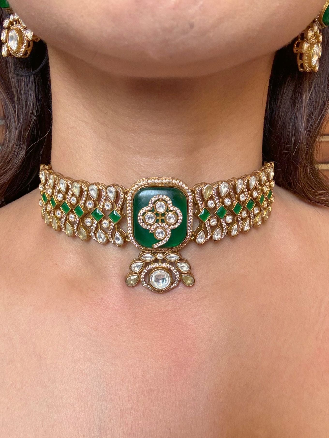 Buy Vidhi Moissanite Beautiful Choker In Emerald Green online in India. Shop from an exclusive range of moissanite jewellery, AD necklace, Kundan necklace for weddings. -front
