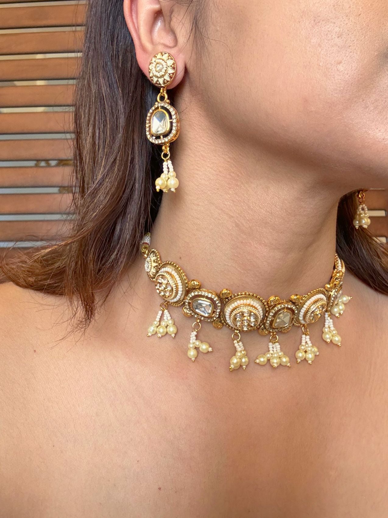 Buy Anaida Gold Plated Kundan & Pearl Choker online in India. Shop from an exclusive range of moissanite jewellery, AD necklace, Kundan necklace for weddings. -side