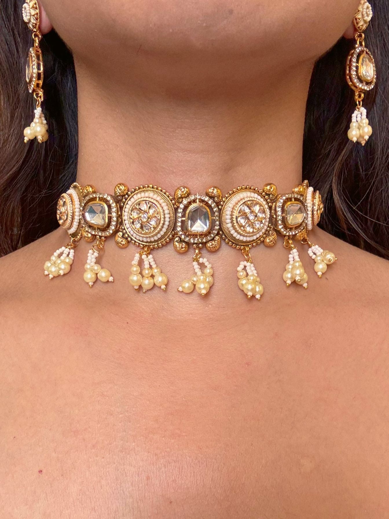 Buy Anaida Gold Plated Kundan & Pearl Choker online in India. Shop from an exclusive range of moissanite jewellery, AD necklace, Kundan necklace for weddings. -front