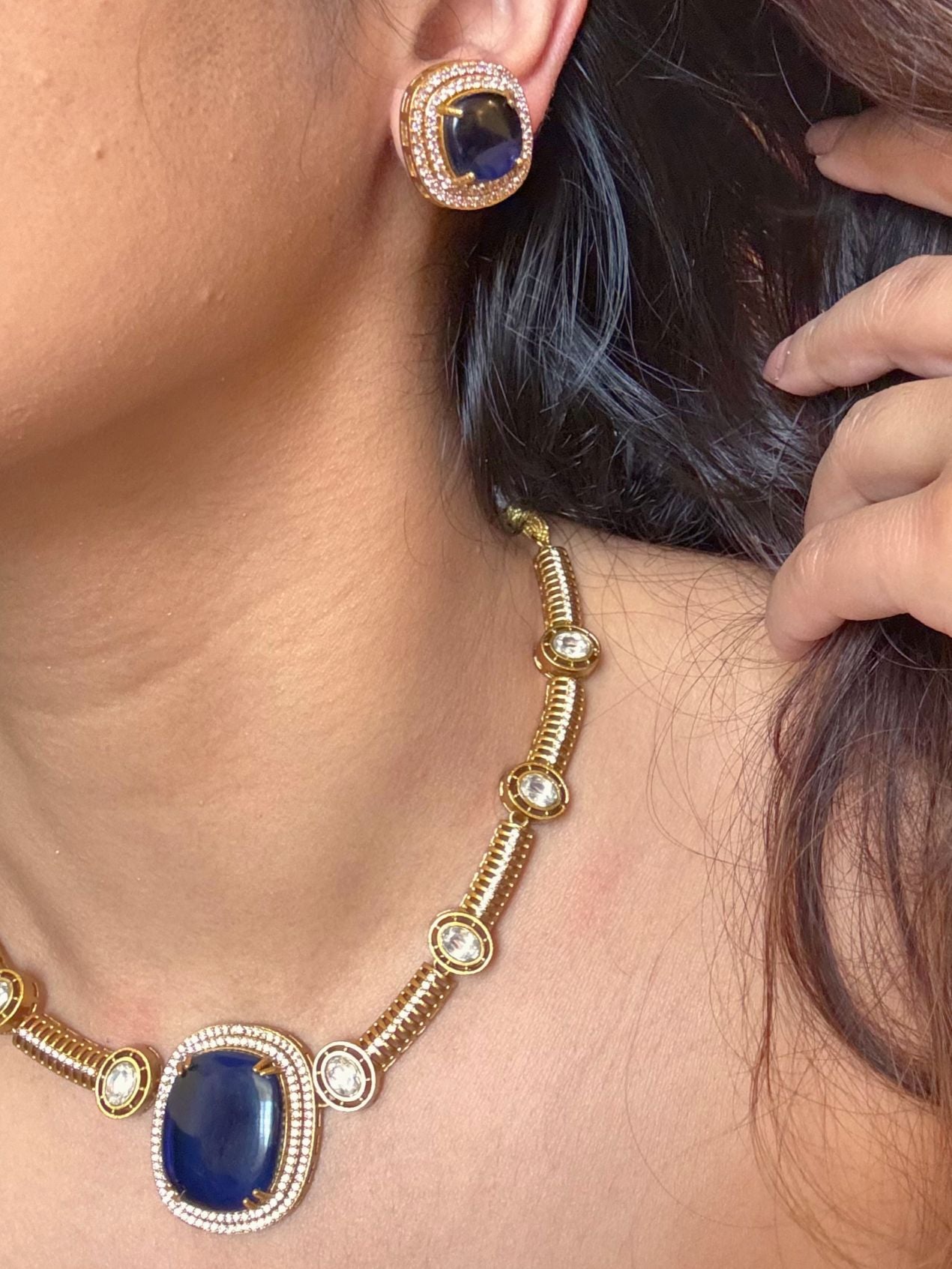 Buy Dharini Gold Polish Hasli Necklace In Navy Blue With Studs online in India. Shop from an exclusive range of moissanite jewellery, AD necklace, Kundan necklace for weddings. -first