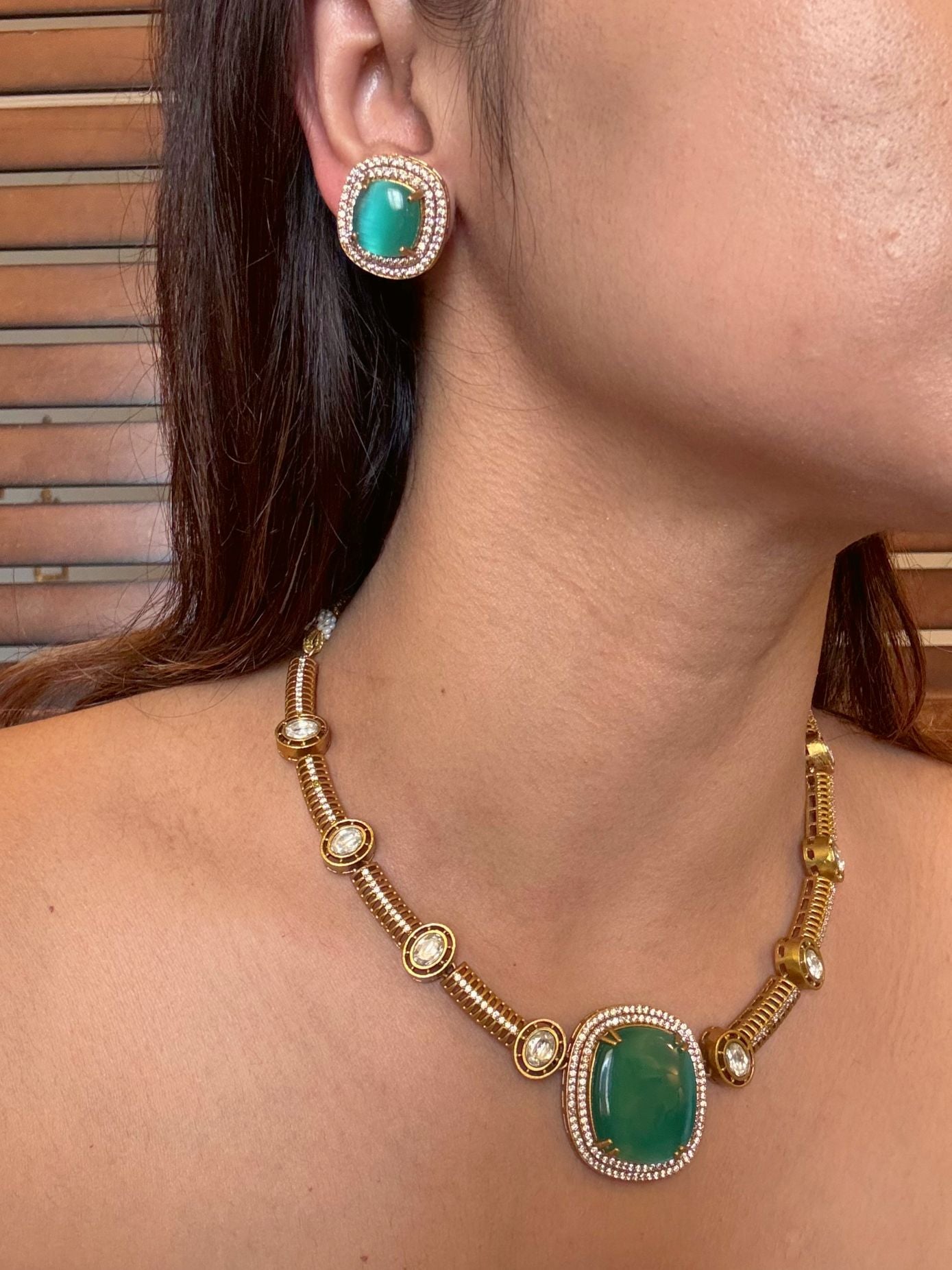 Buy Dharini Gold Polish Hasli Necklace In Mint Green With Studs online in India. Shop from an exclusive range of moissanite jewellery, AD necklace, Kundan necklace for weddings. -second