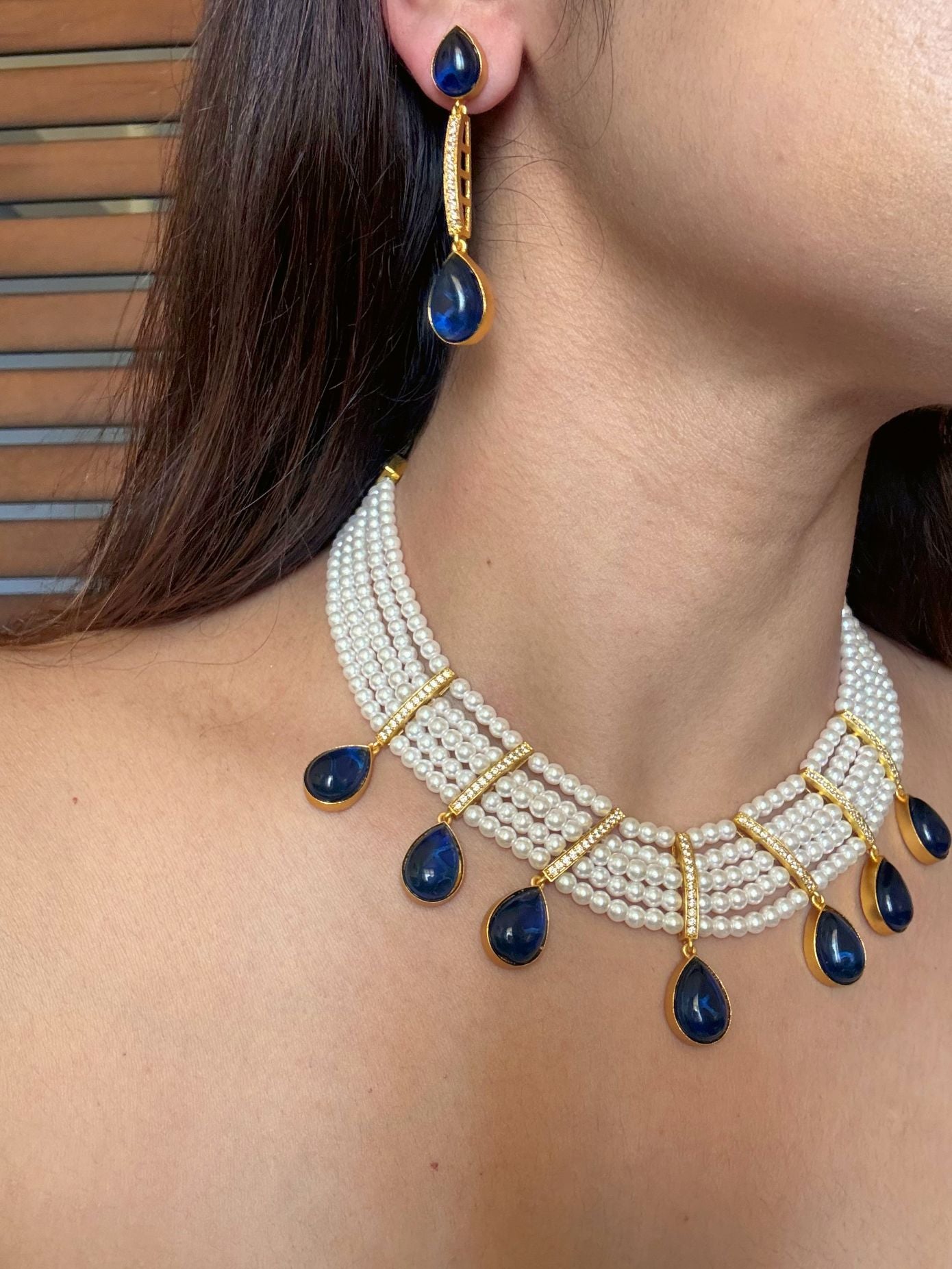 Buy Priyaanka Pearl Necklace With Blue Stone Drops online in India. Shop from an exclusive range of CZ jewellery, moissanite jewellery, AD necklace, Kundan necklace for weddings. -second