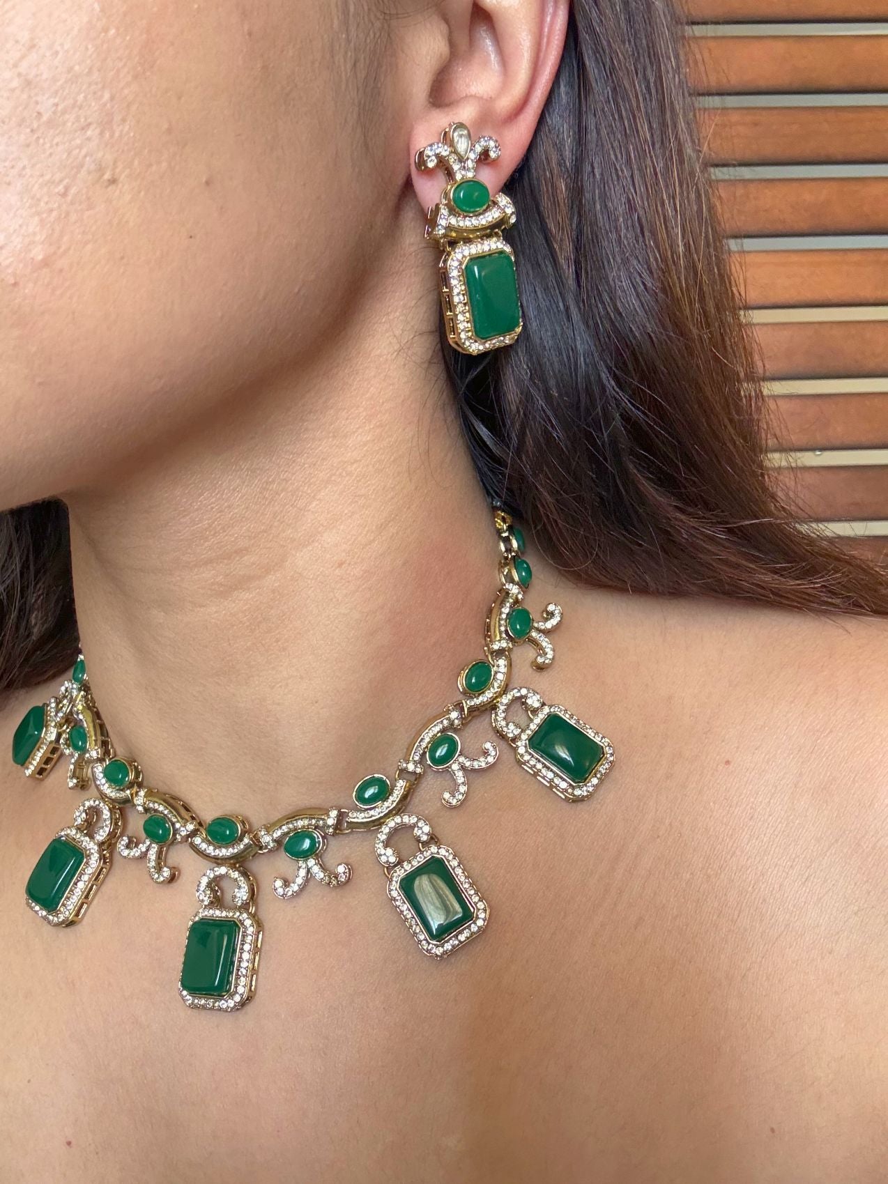 Buy Nirvi Emerald Glass Stone AD Statement Necklace With Tikka online in India. Shop from an exclusive range of CZ jewellery, moissanite jewellery, AD necklace. -side