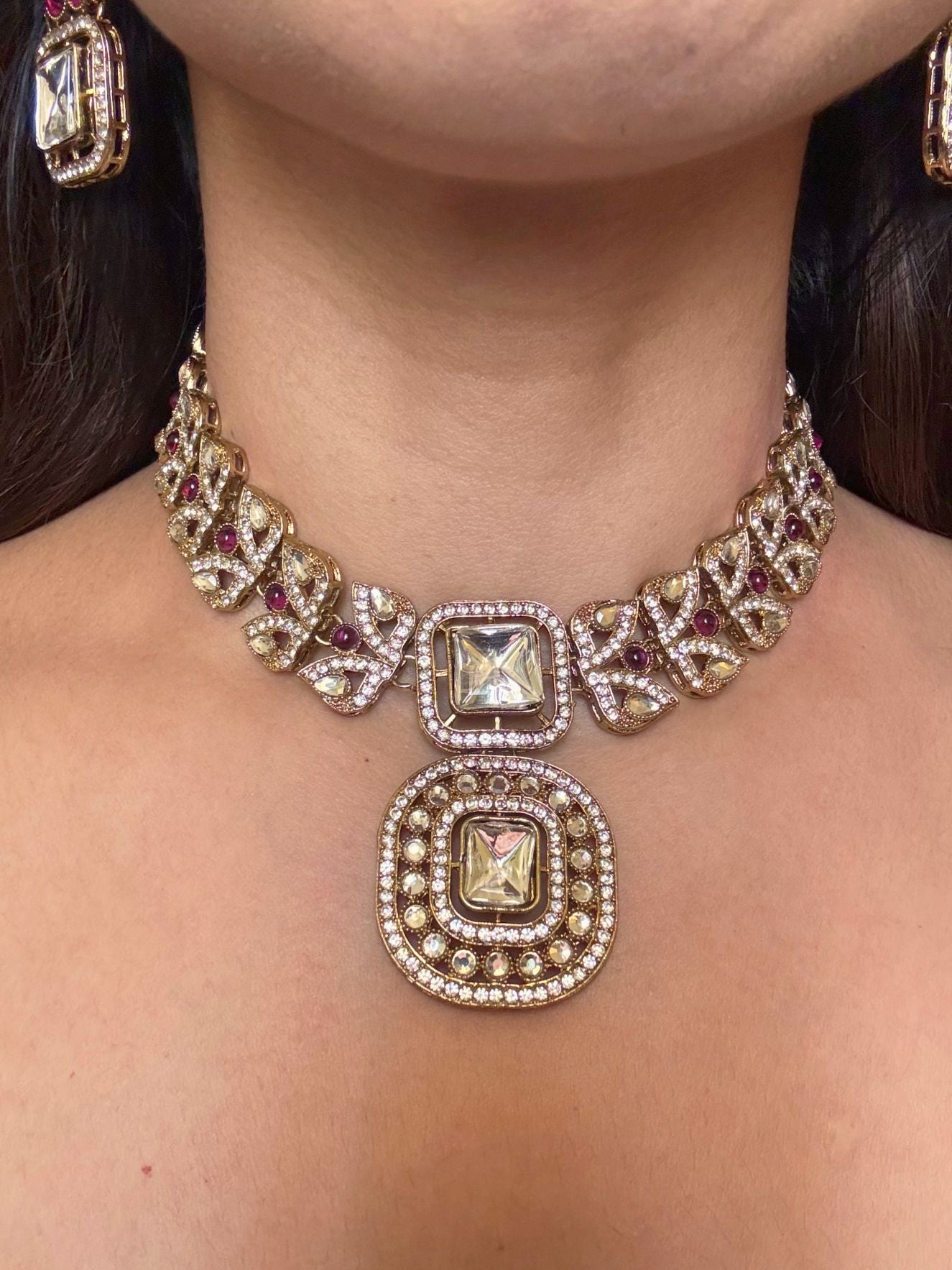 Buy Maahika AD Kundan Necklace In Red With Tikka online in India. Shop from an exclusive range of CZ jewellery, moissanite jewellery, AD necklace, Kundan necklace for weddings. -front