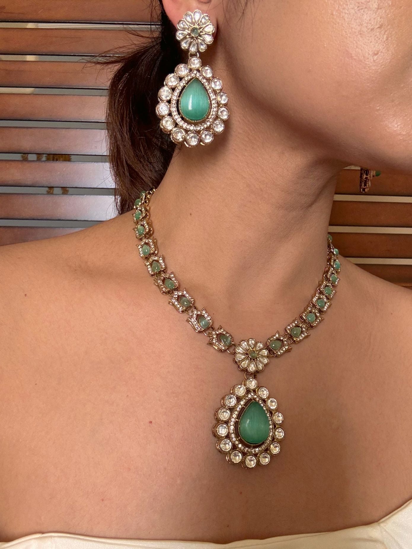 Buy Mint Green Kundan Pendant Set with Maang Tikka online in India. Shop from an exclusive range of jewellery, AD necklace, Kundan necklace for weddings. -side