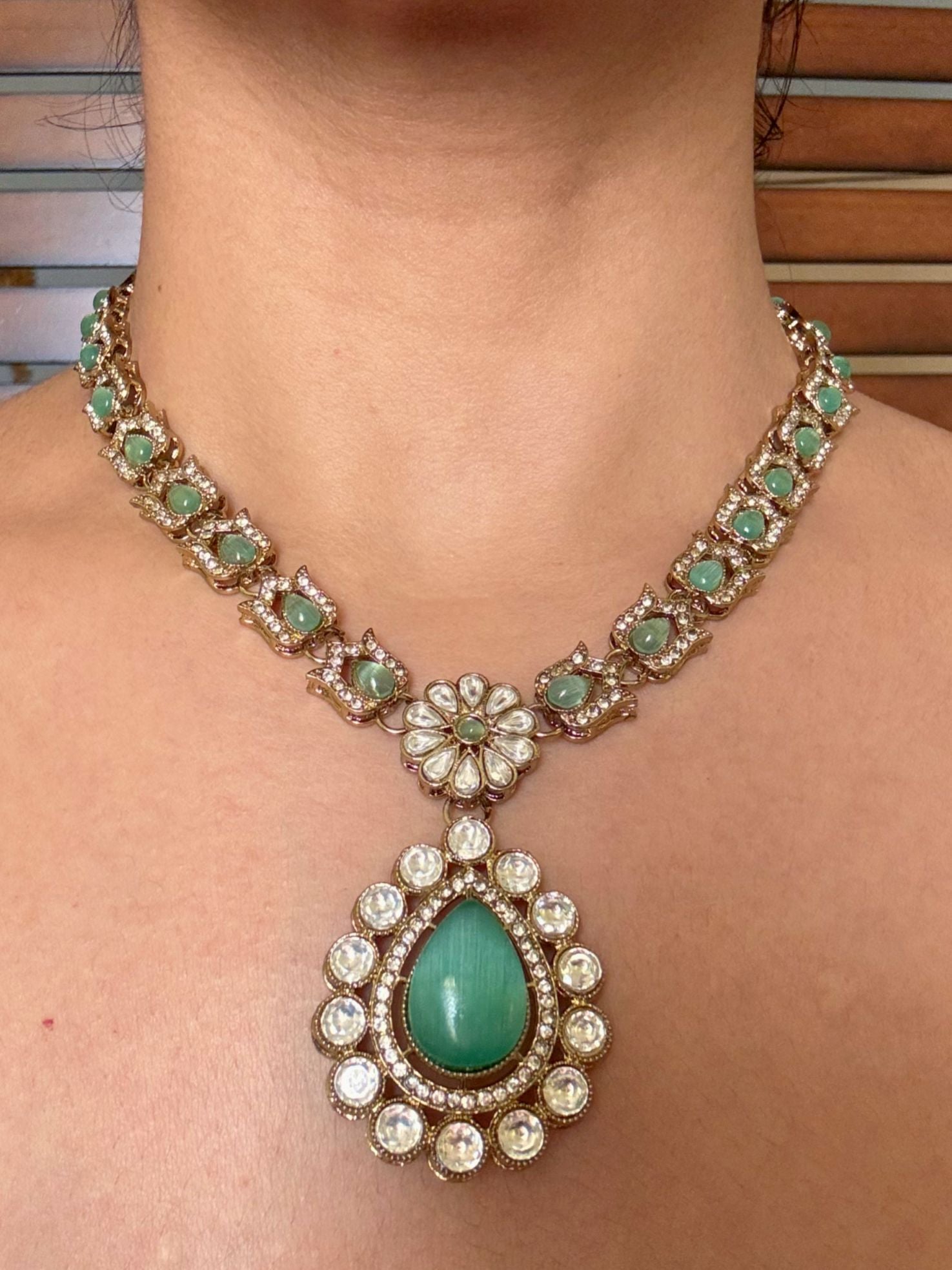 Buy Mint Green Kundan Pendant Set with Maang Tikka online in India. Shop from an exclusive range of jewellery, AD necklace, Kundan necklace for weddings. -front