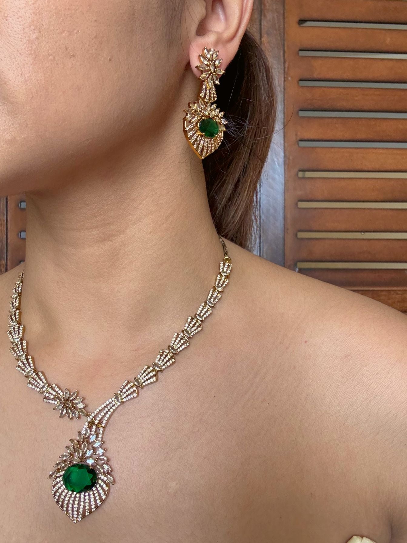 Buy Emerald Bloom Radiance Statement Necklace With Tikka online in India. Shop from an exclusive range of jewellery, AD necklace, Kundan necklace for weddings. -second 