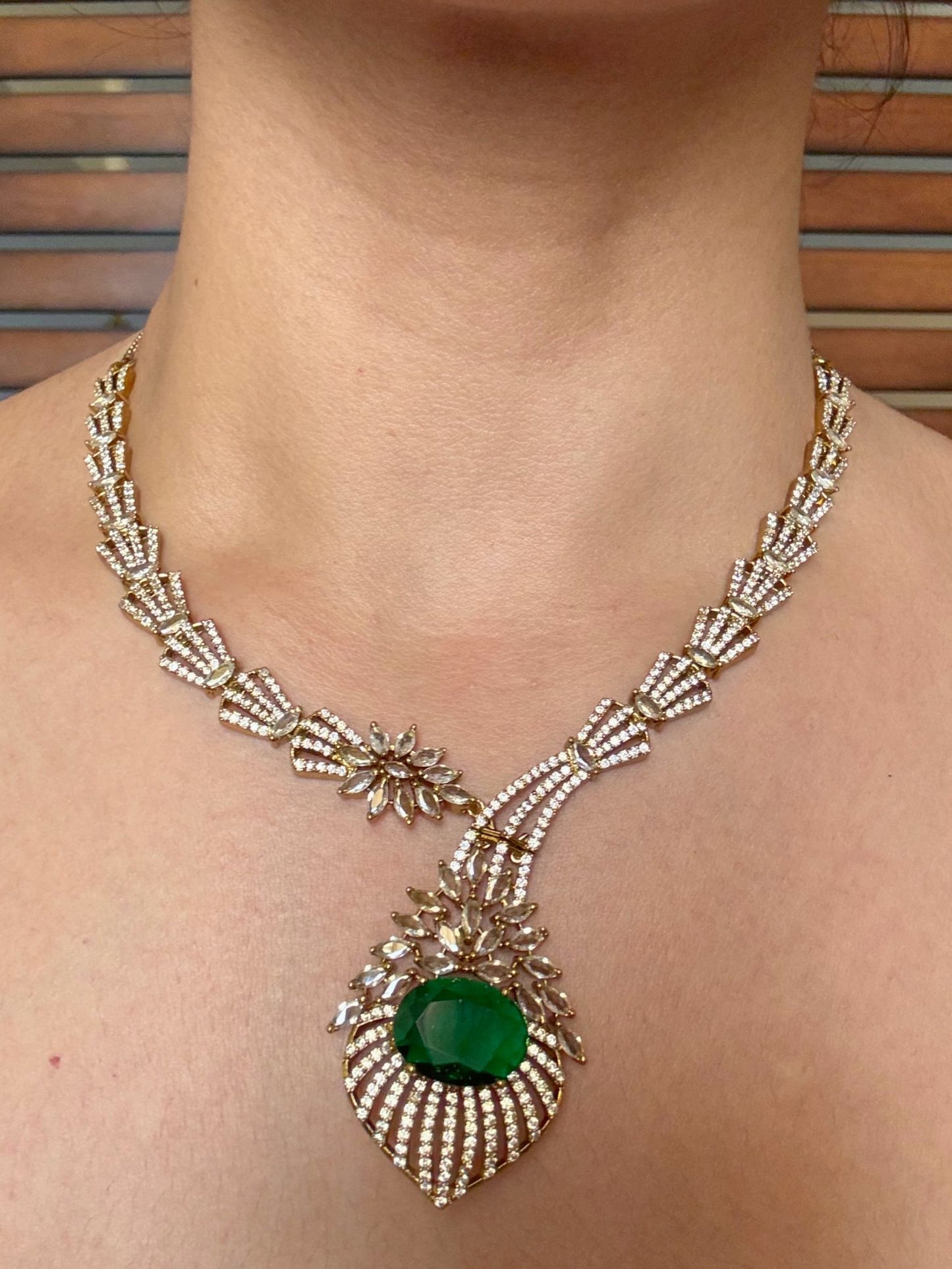 Buy Emerald Bloom Radiance Statement Necklace With Tikka online in India. Shop from an exclusive range of jewellery, AD necklace, Kundan necklace for weddings. -front