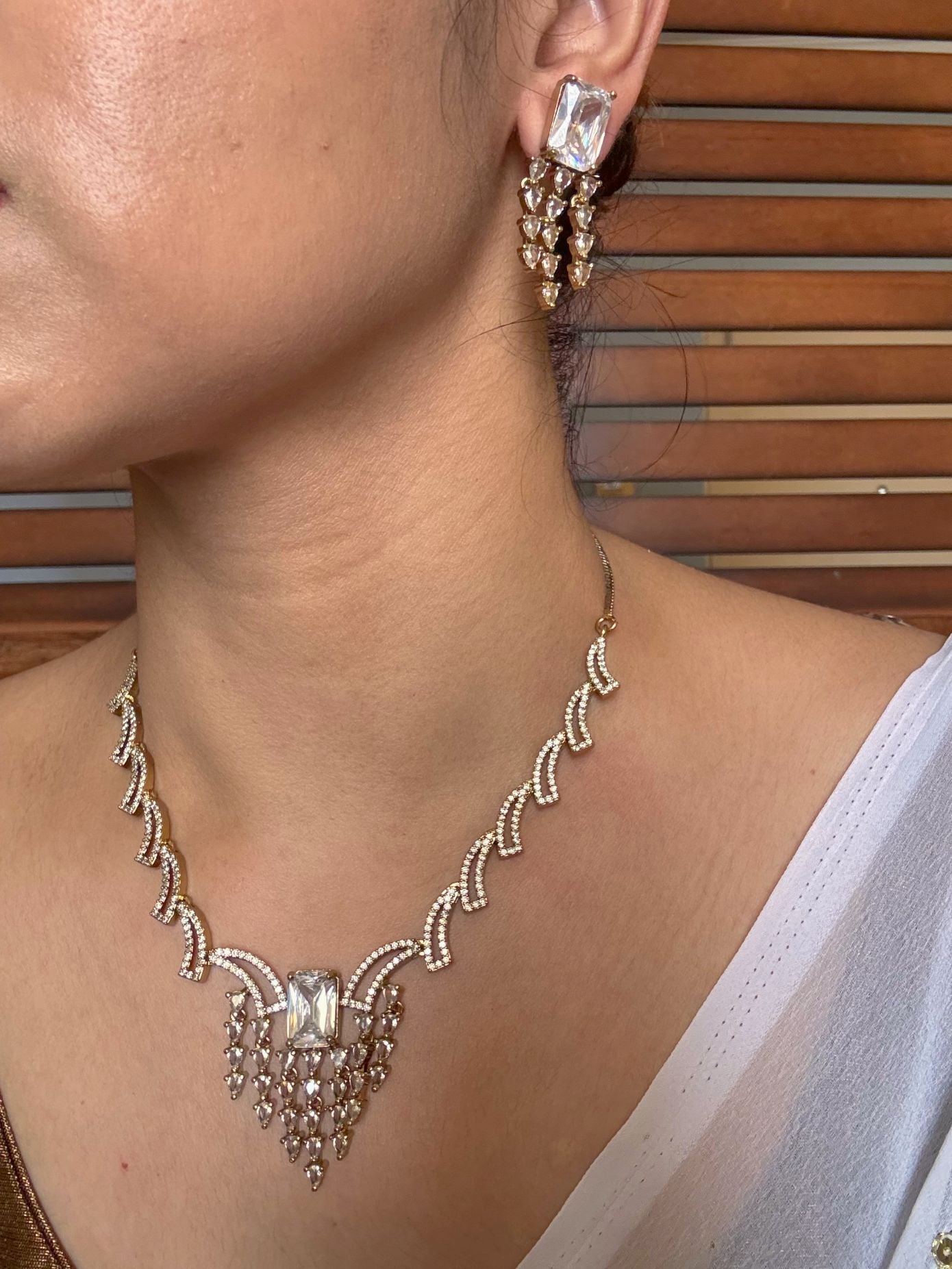 Buy Rukmini AD Necklace With White Stone Accent online in India. Shop from an exclusive range of jewellery, AD necklace, Kundan necklace for weddings. -side