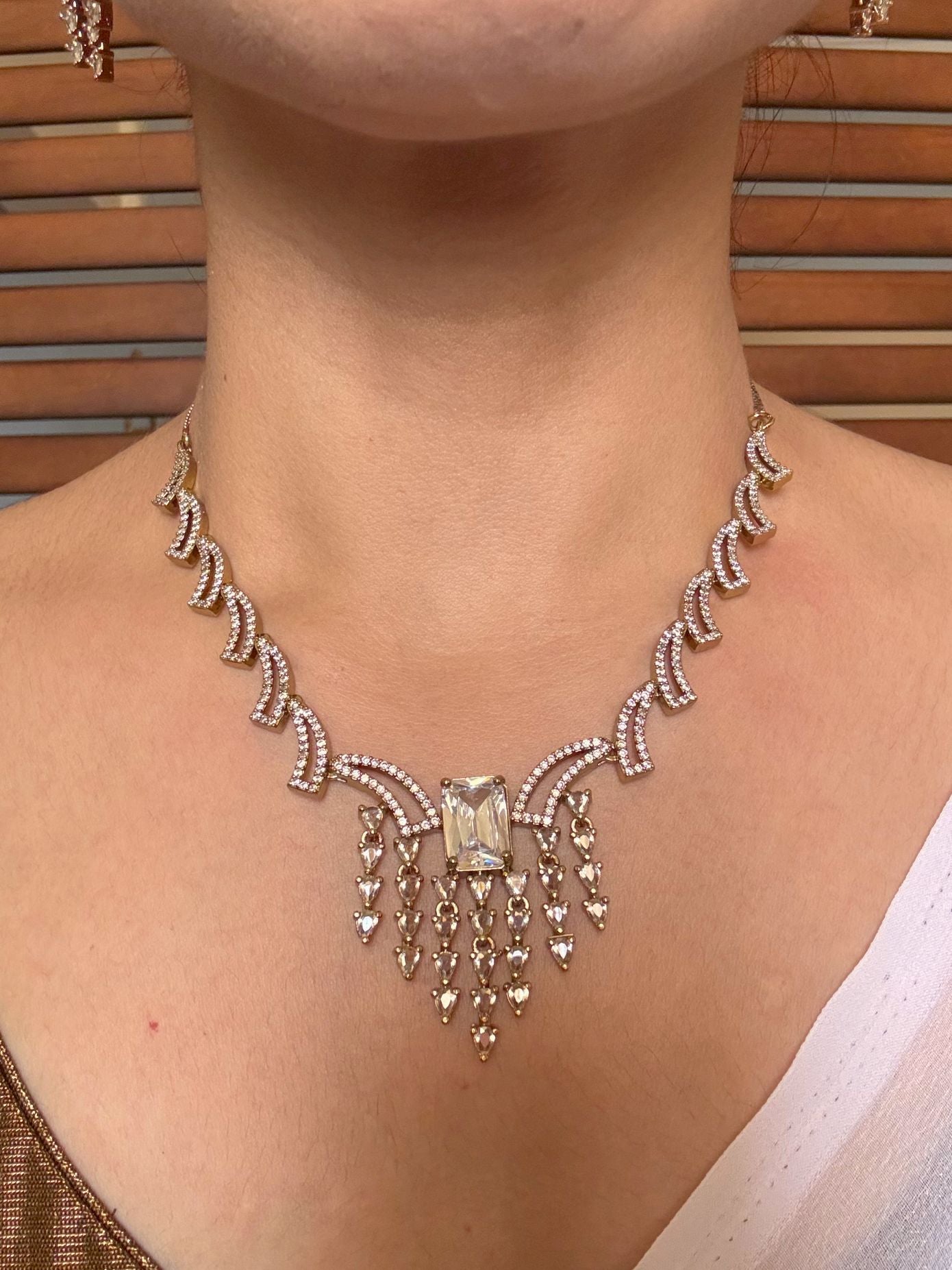 Buy Rukmini AD Necklace With White Stone Accent online in India. Shop from an exclusive range of jewellery, AD necklace, Kundan necklace for weddings. -front
