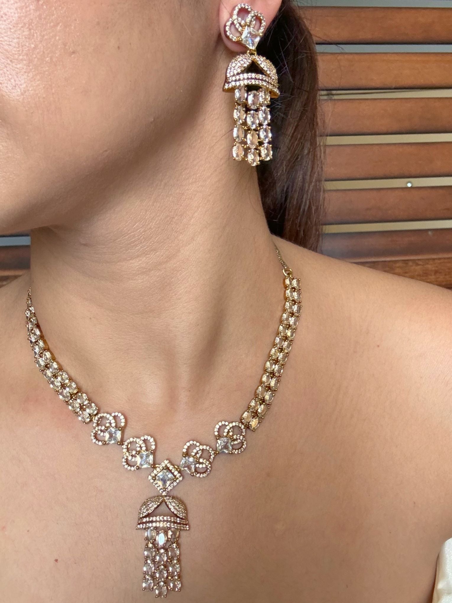 Buy Sheesh Mahal Antique Gold Jhumka Drop Statement Necklace Set online in India. Shop from an exclusive range of jewellery, AD necklace, Kundan necklace for weddings. -side