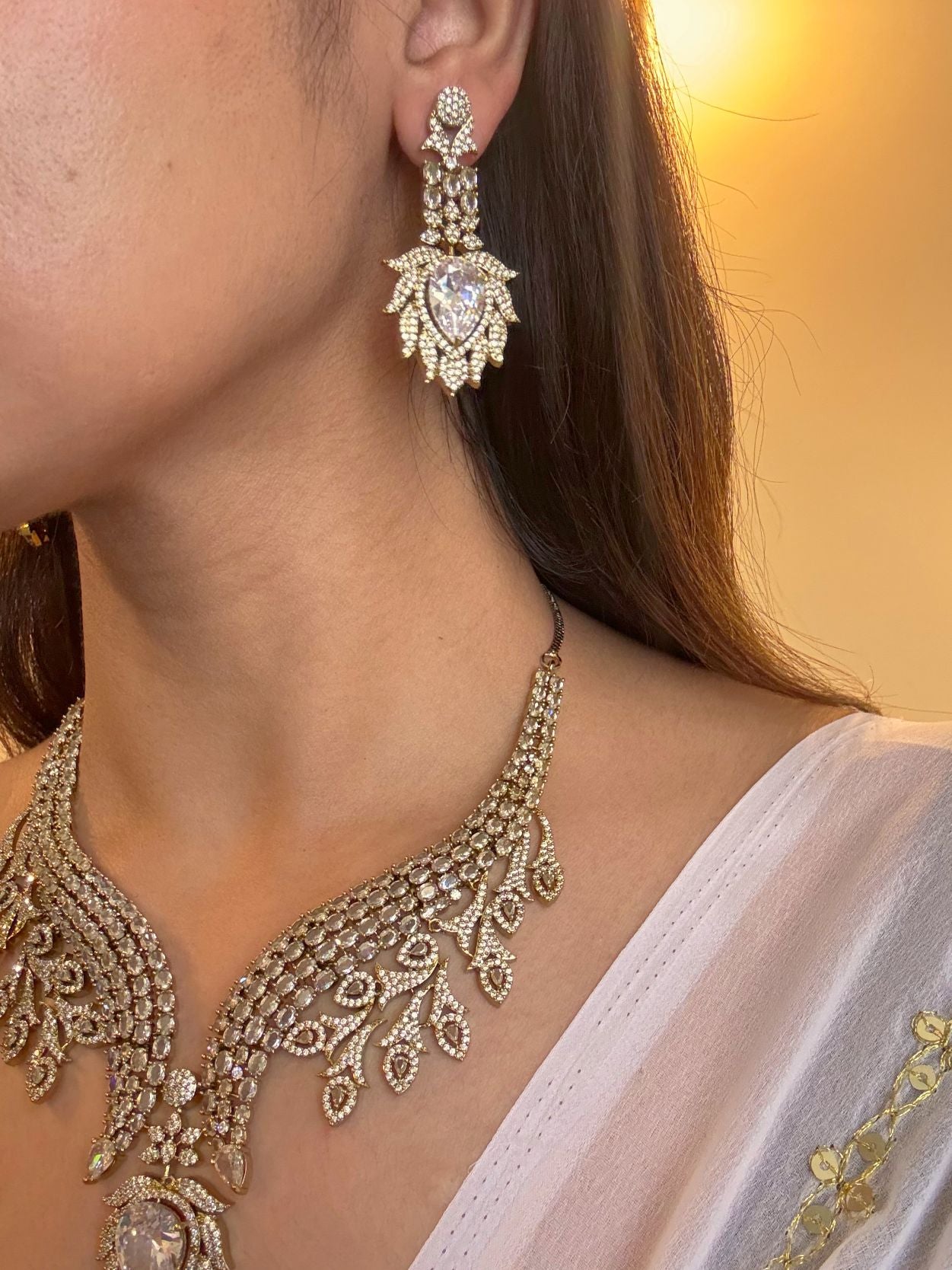 Buy Celestial Cascade AD Statement Necklace In White online in India. Shop from an exclusive range of jewellery, AD necklace, Kundan necklace for weddings. -side 