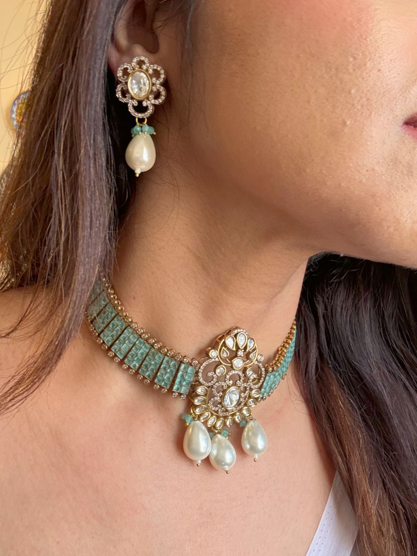 Buy Rajsi Doublet Stone Pearl Premium Kundan Choker Necklace Set online in India. Shop from an exclusive range of jewellery, AD necklace, Kundan necklace for weddings. -side