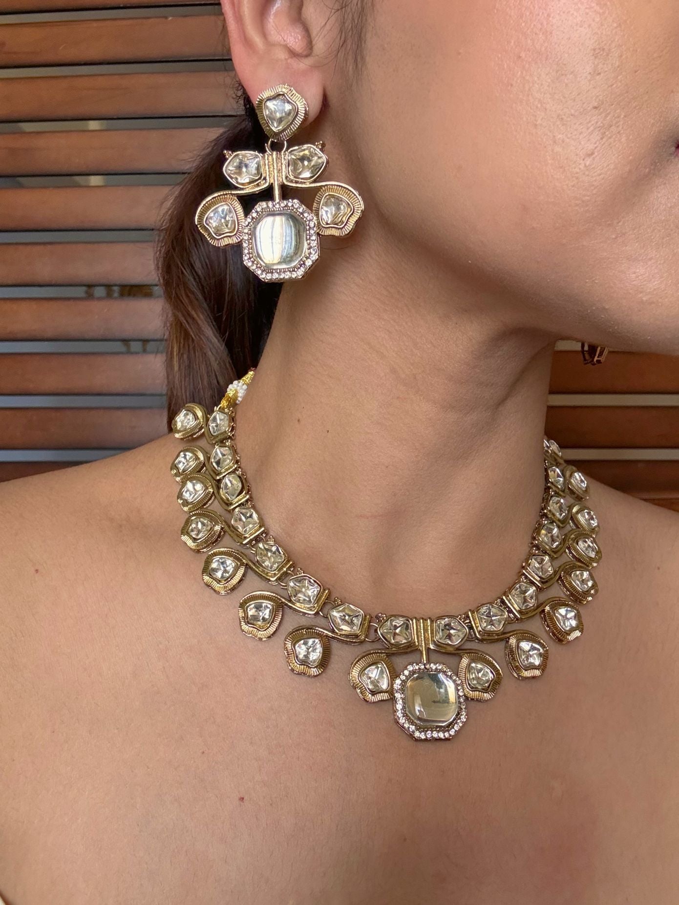 Buy Noorani Kundan Necklace With Maang Tikka In White online in India. Shop from an exclusive range of jewellery, AD necklace, Kundan necklace for weddings. -side