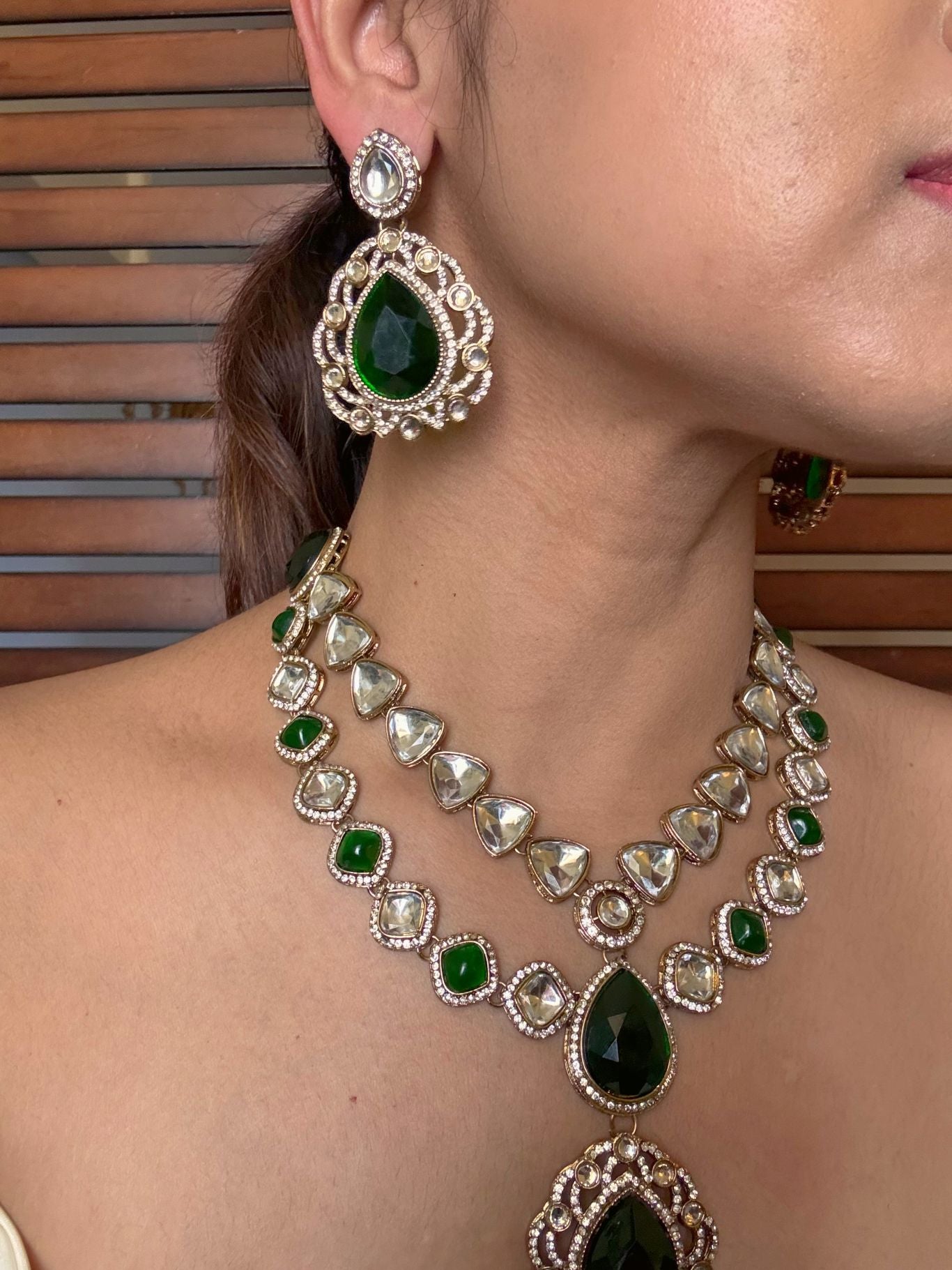Buy Green Kundan Layered Wedding Necklace Set With Tikka online in India. Shop from an exclusive range of jewellery, AD necklace, Kundan necklace for weddings. -side