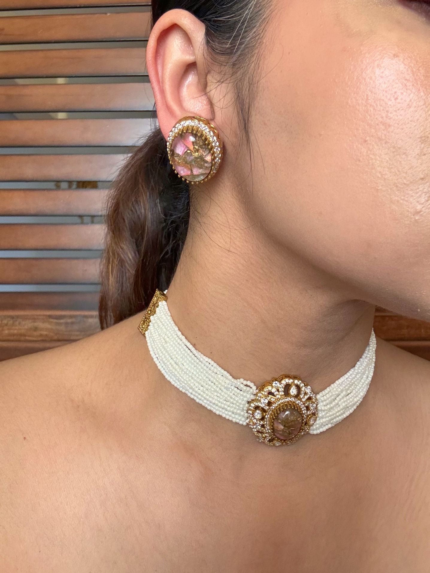 Buy Royal Pearl Weave Choker with Fire Stone Accent online in India. Shop from an exclusive range of jewellery, AD necklace, Kundan necklace for weddings. -side