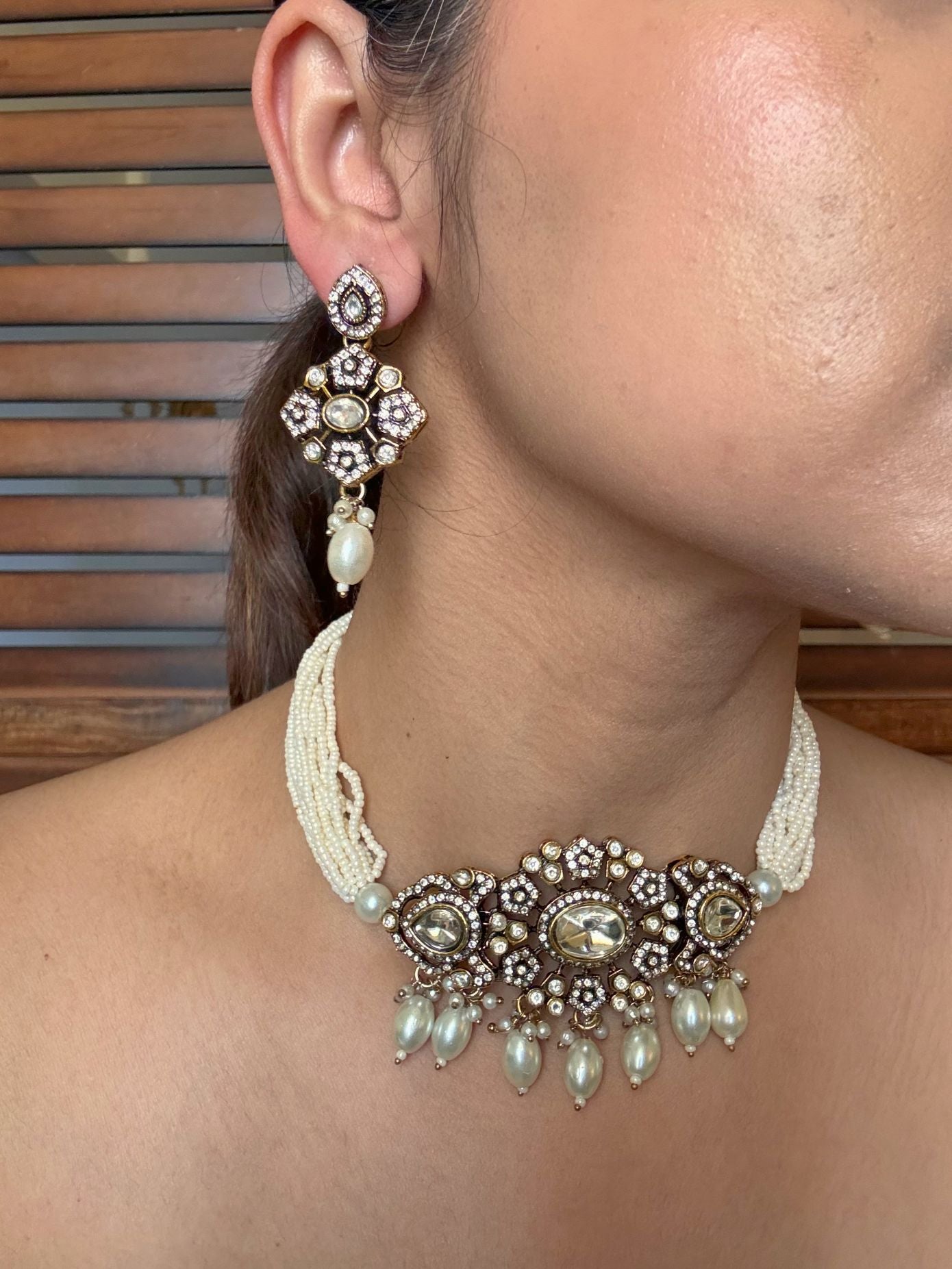 Buy Noor Jahan Kundan Pearl Tassel Drops Choker online in India. Shop from an exclusive range of jewellery, AD necklace, Kundan necklace for weddings. -side