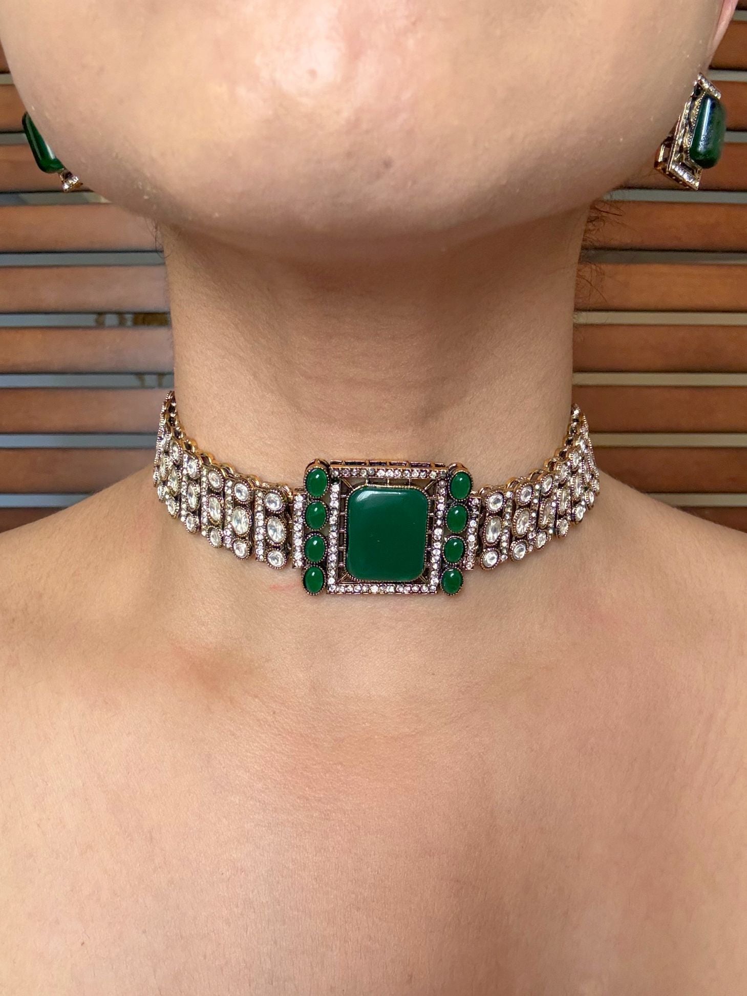 Buy Regal Green Moissanite Choker With Stud Earrings online in India. Shop from an exclusive range of jewellery, AD necklace, Kundan necklace for weddings. -front