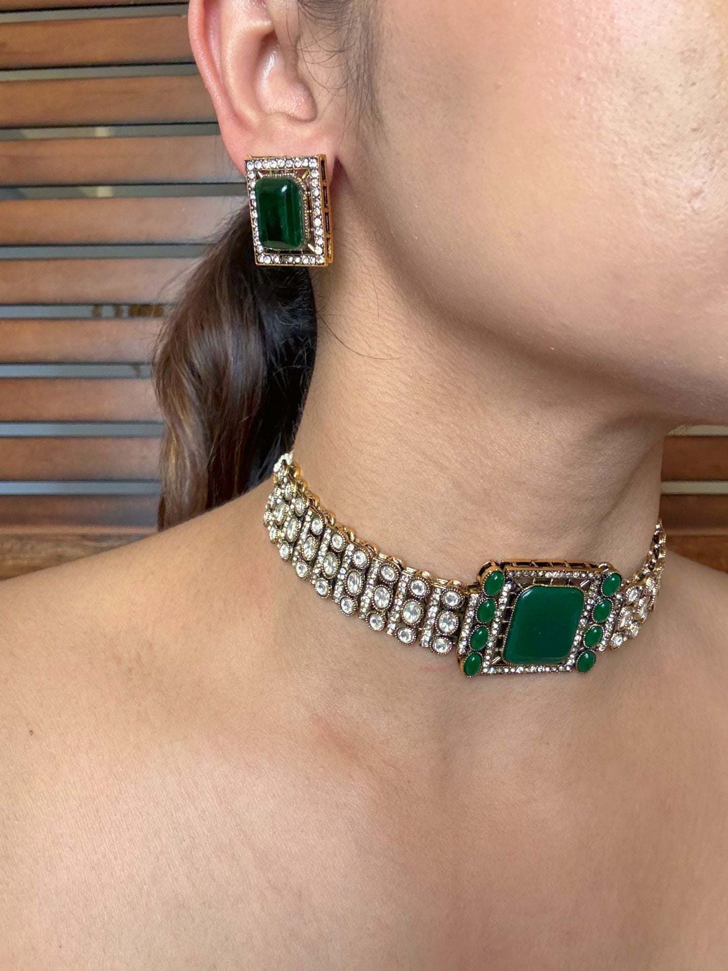 Buy Regal Green Moissanite Choker With Stud Earrings online in India. Shop from an exclusive range of jewellery, AD necklace, Kundan necklace for weddings. -side