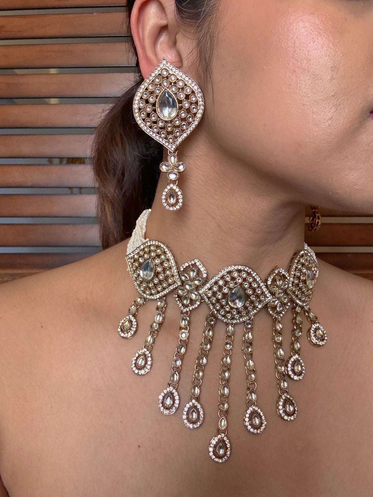 Buy Mehrunisa Kundan Choker Necklace With Big Earrings online in India. Shop from an exclusive range of jewellery, AD necklace, Kundan necklace for weddings. -second