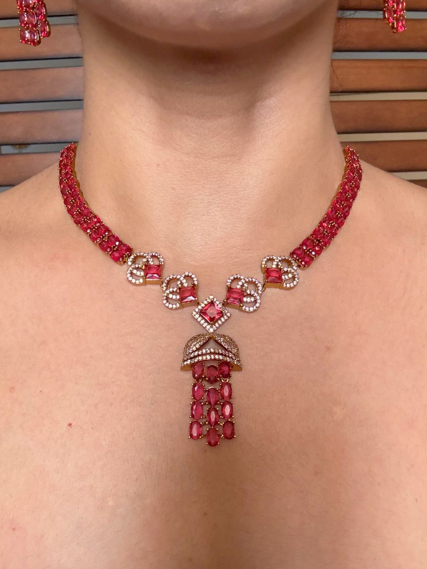 Buy Sheesh Mahal Antique Gold Statement Necklace Set In Red online in India. Shop from an exclusive range of jewellery, AD necklace, Kundan necklace for weddings. -front