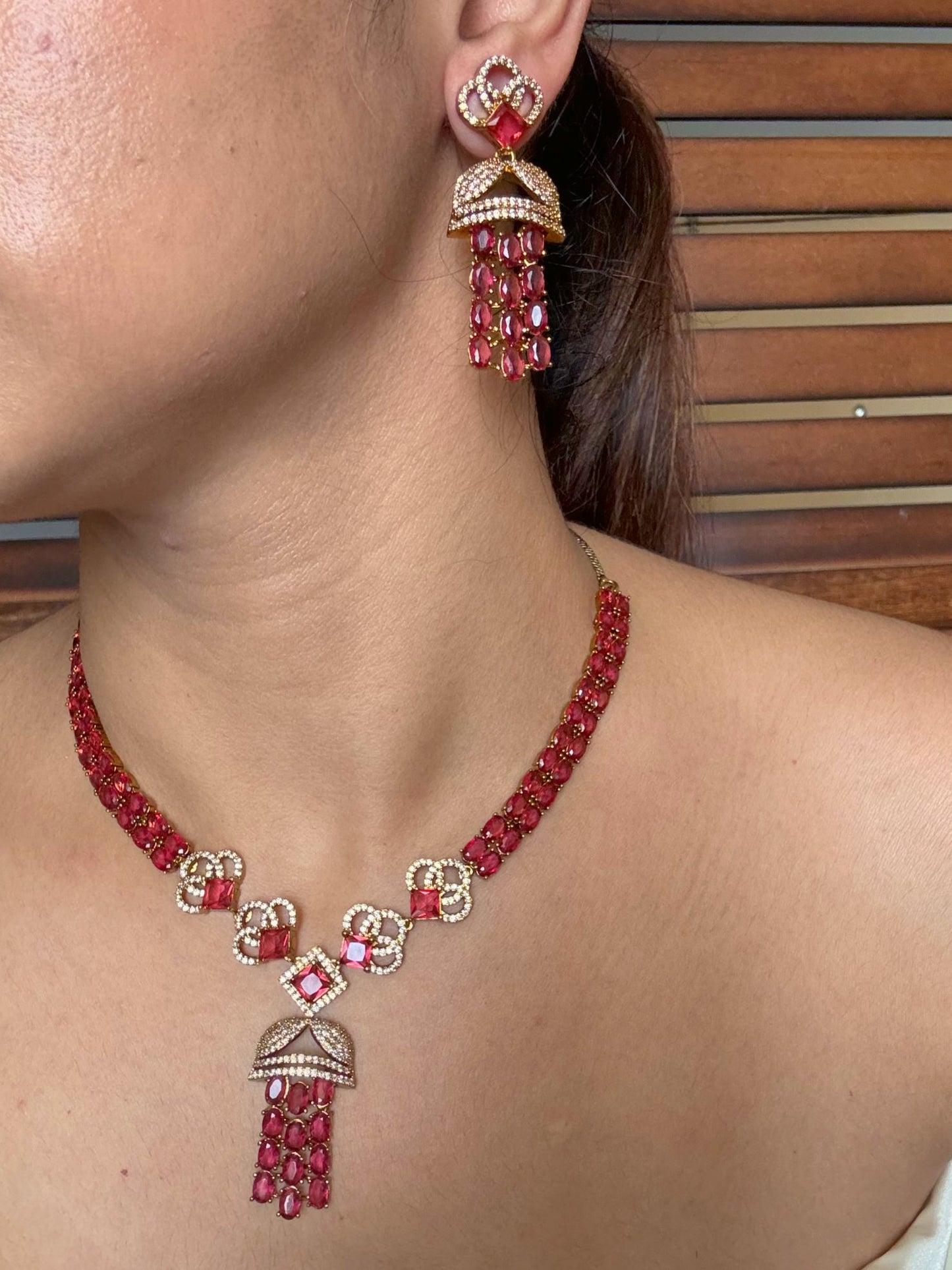 Buy Sheesh Mahal Antique Gold Statement Necklace Set In Red online in India. Shop from an exclusive range of jewellery, AD necklace, Kundan necklace for weddings. -side
