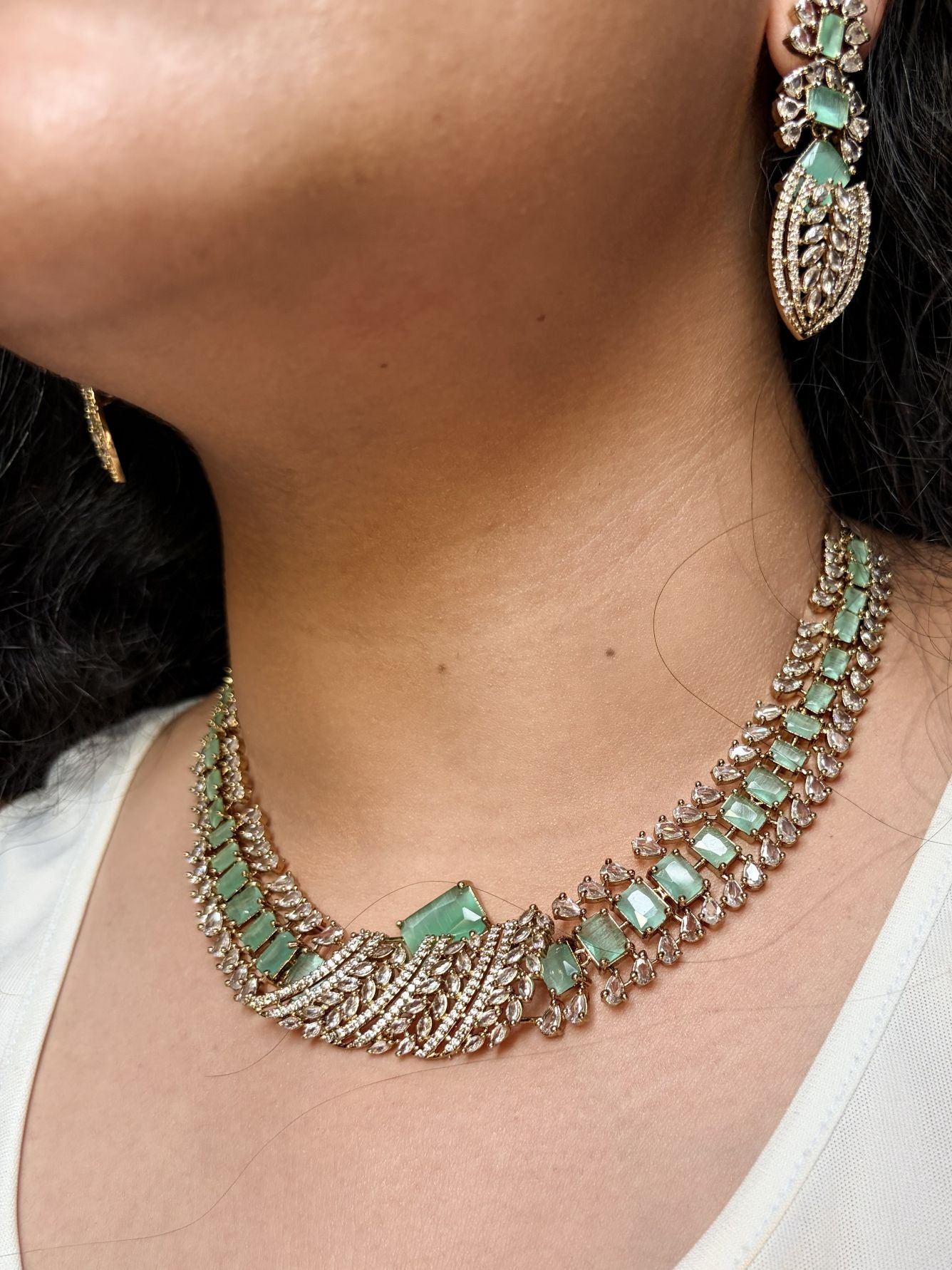Buy Zarisha Royal AD Necklace and Earrings Set In Mint Green online in India. Shop from an exclusive range of jewellery, AD necklace, Kundan necklace for weddings. -side