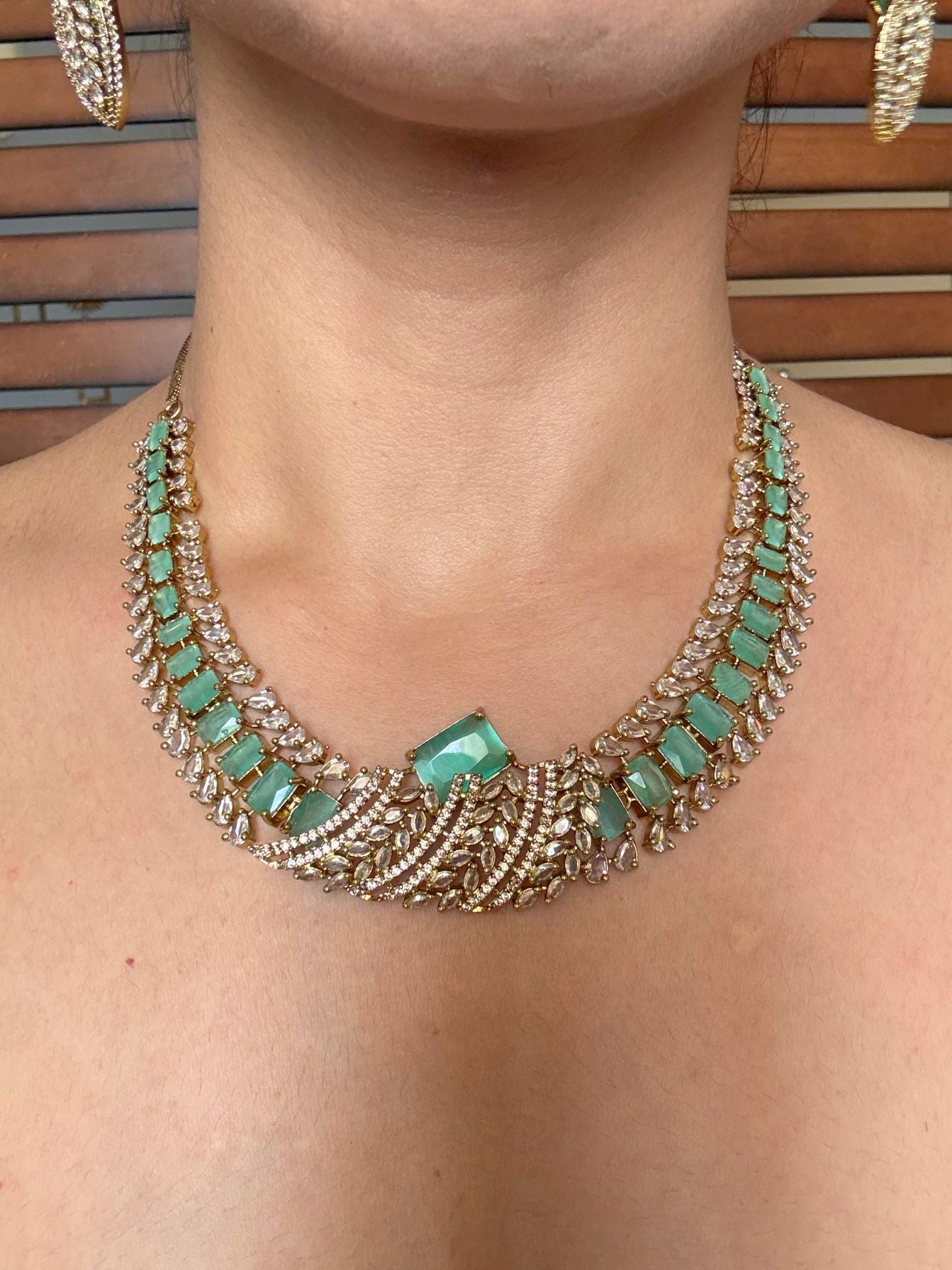Buy Zarisha Royal AD Necklace and Earrings Set In Mint Green online in India. Shop from an exclusive range of jewellery, AD necklace, Kundan necklace for weddings. -front