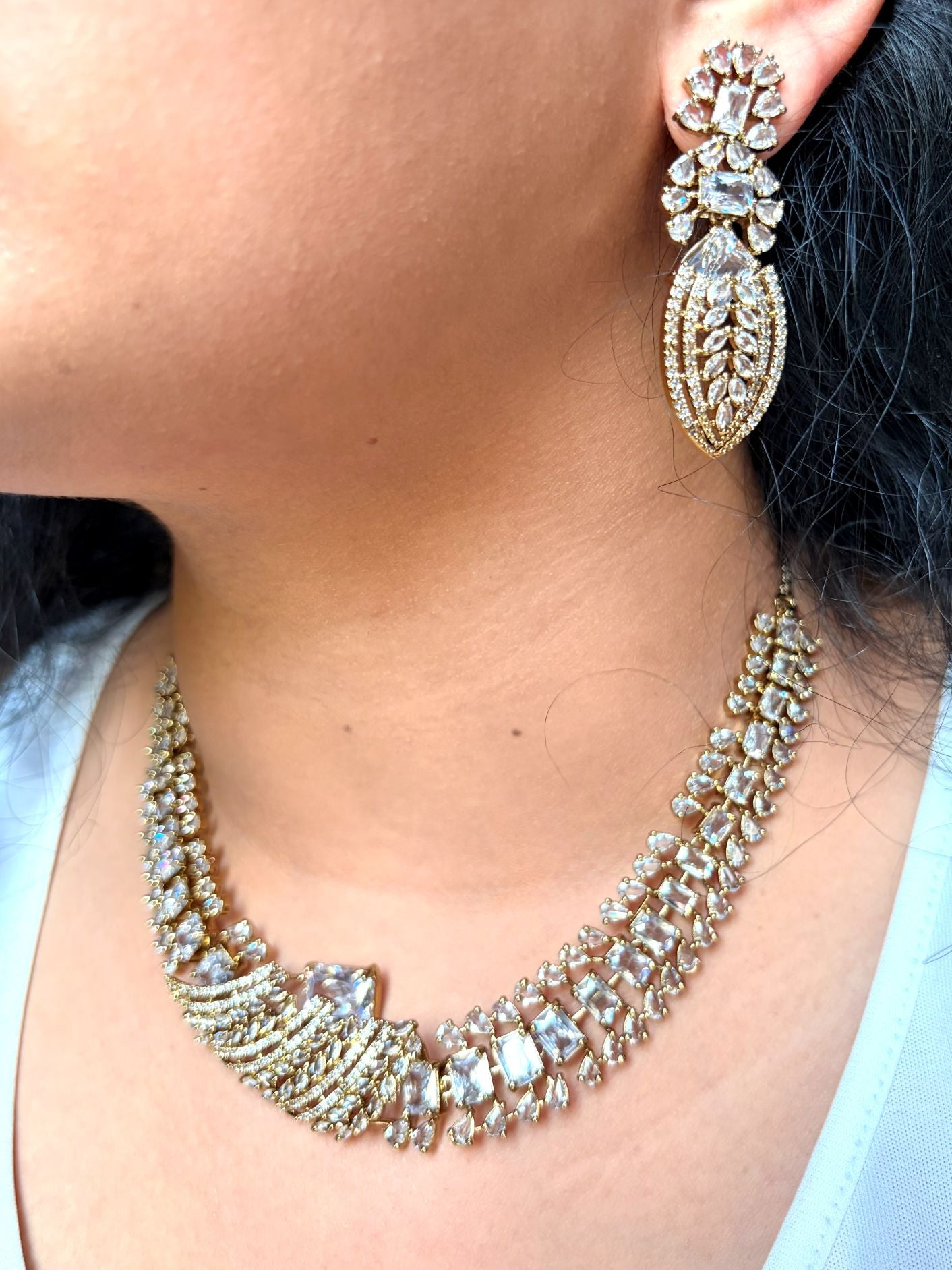 Buy Zarisha Royal AD Necklace and Earrings Set In White online in India. Shop from an exclusive range of jewellery, AD necklace, Kundan necklace for weddings. -side