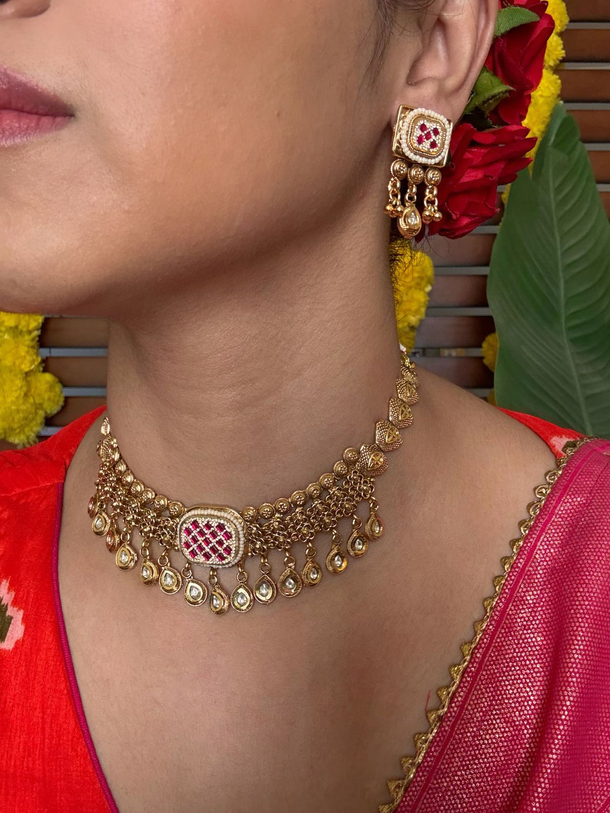 Buy Mrignaini Traditional Gold Necklace online in India. Shop from an exclusive range of jewellery, gold imitation necklace, brass necklace for weddings. -side