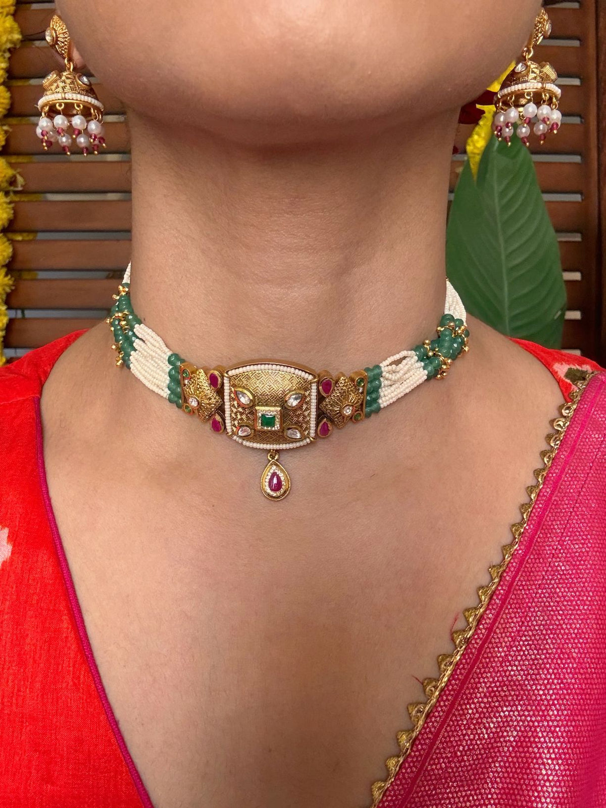 Buy Vasanti Antique Gold Brass Choker With Jhumka online in India. Shop from an exclusive range of jewellery, gold imitation necklace, brass necklace for weddings. -front