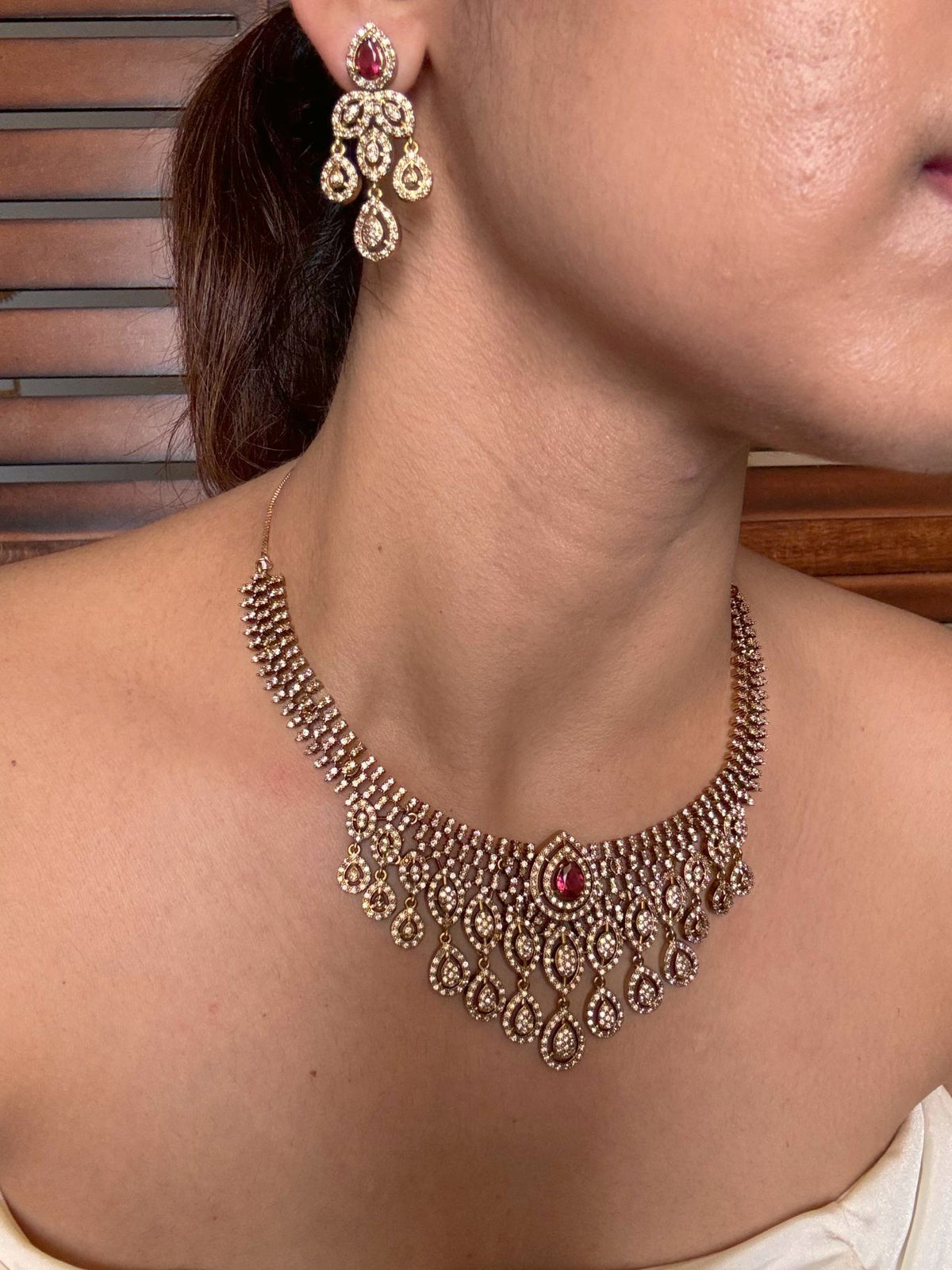 Shop jharna antique AD necklace set online in India in red stone. Shop from an exclusive range of jewellery, AD necklace, Kundan necklace for weddings. -second