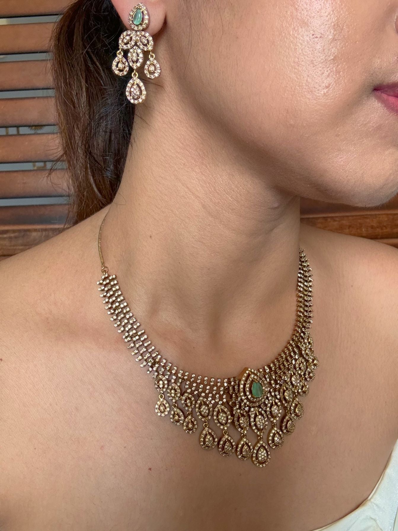 Buy jharna antique AD necklace set online in India in mint green stone. Shop from an exclusive range of jewellery, AD necklace, Kundan necklace for weddings. -side