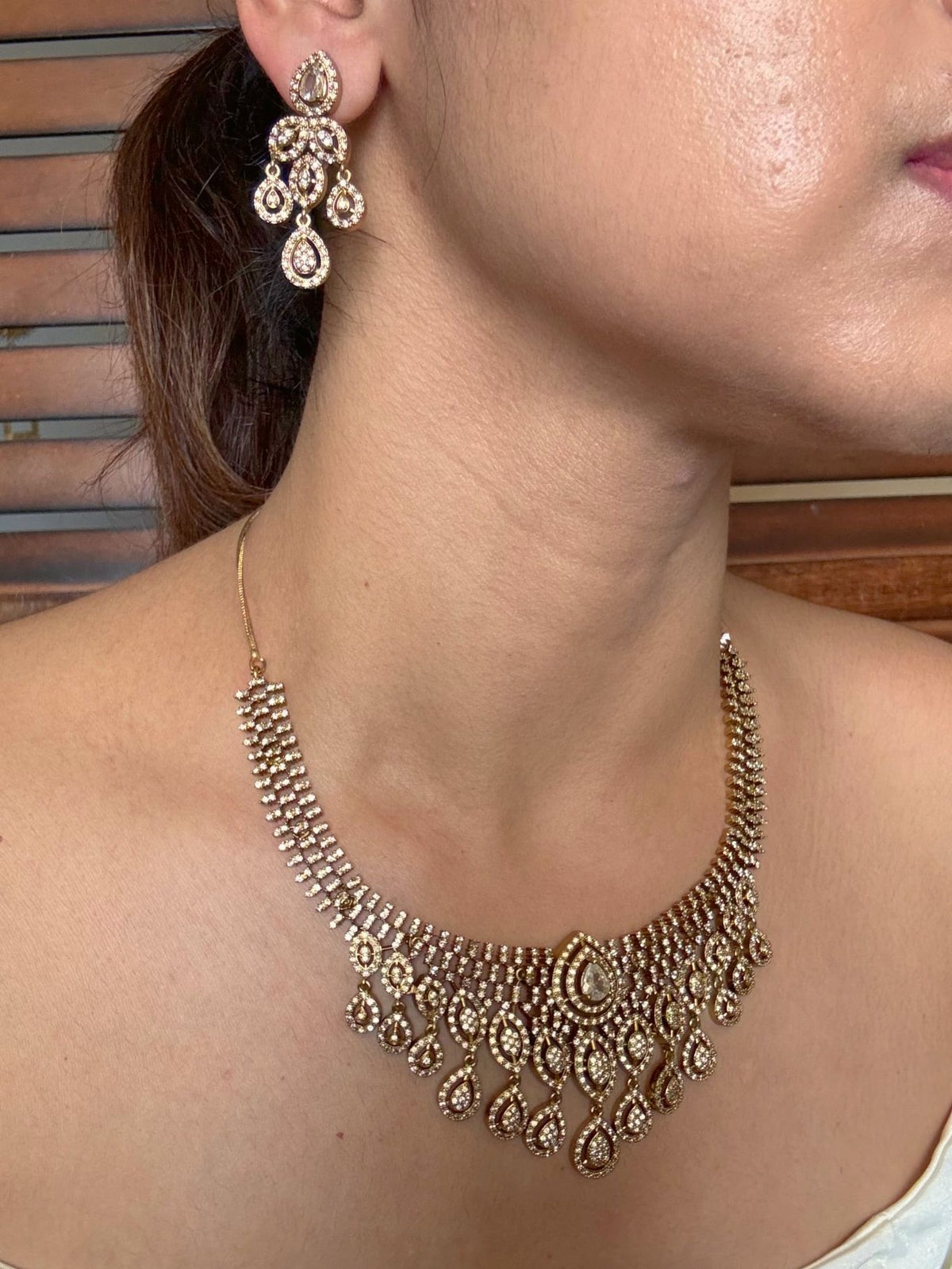 Buy Jharna antique AD necklace set online in India in white stone. Shop from an exclusive range of jewellery, AD necklace, Kundan necklace for weddings. -side