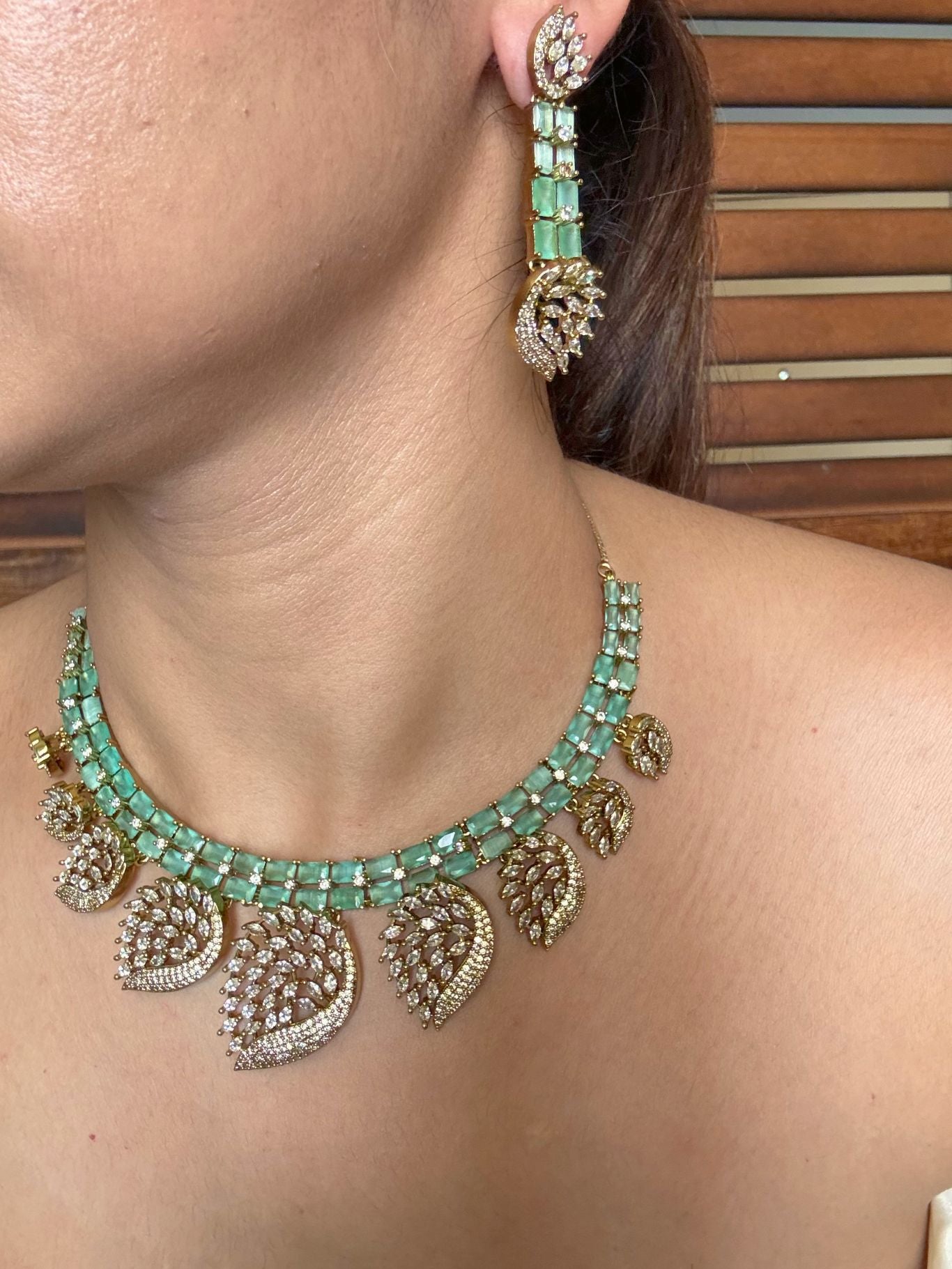 Shop mint green and white AD patra necklace set online in India. Shop from an exclusive range of jewellery, AD necklace, Kundan necklace for weddings. -side