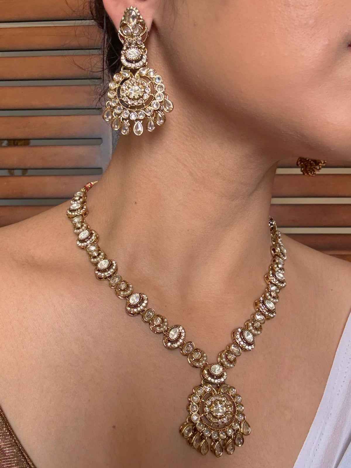Buy Shivanshi Long Kundan Wedding Set With Tikka online in India. Shop from an exclusive range of jewellery, AD necklace, Kundan necklace for weddings. -Side
