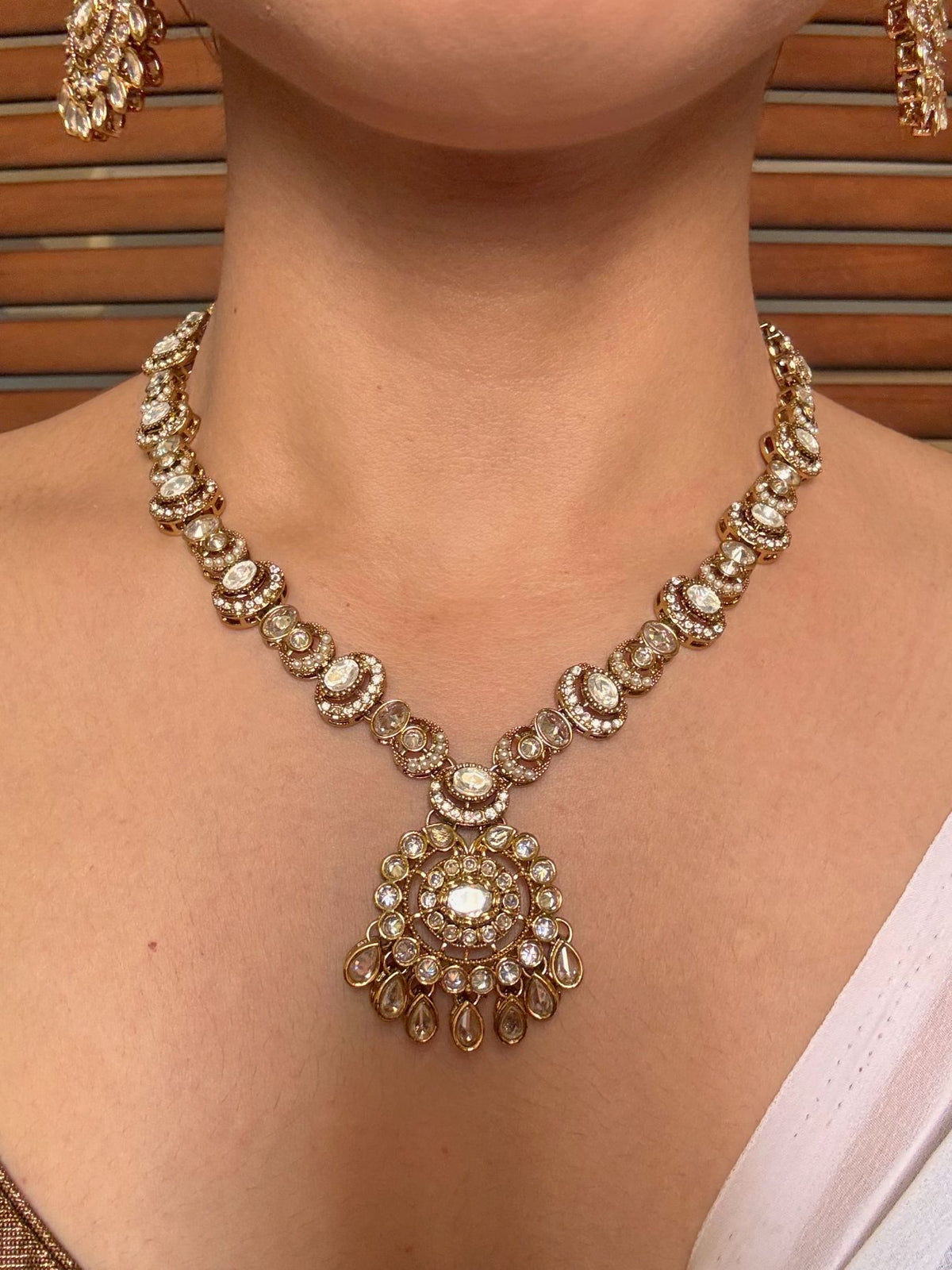 Buy Shivanshi Long Kundan Wedding Set With Tikka online in India. Shop from an exclusive range of jewellery, AD necklace, Kundan necklace for weddings. -front