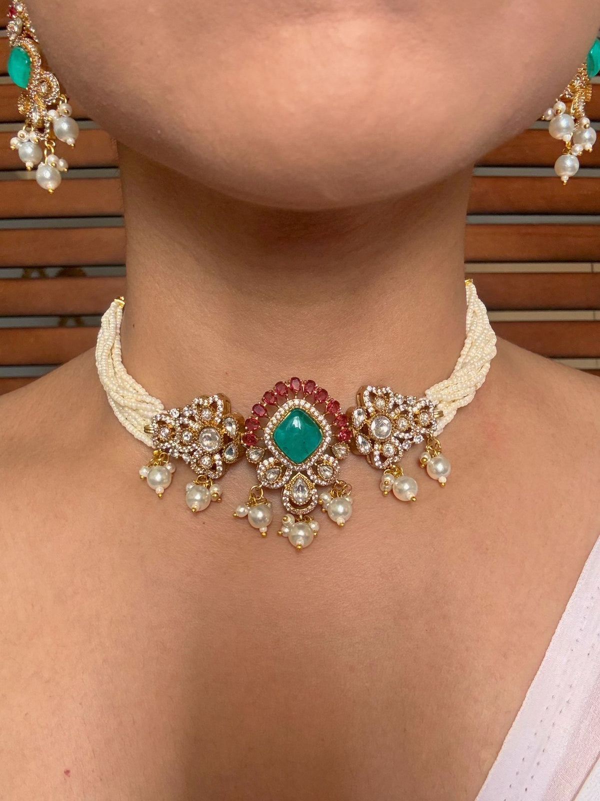 Buy Mohana Moissanite Choker In Pearl And Green Stones online in India. Shop from an exclusive range of jewellery, AD necklace, Kundan necklace for weddings. -front