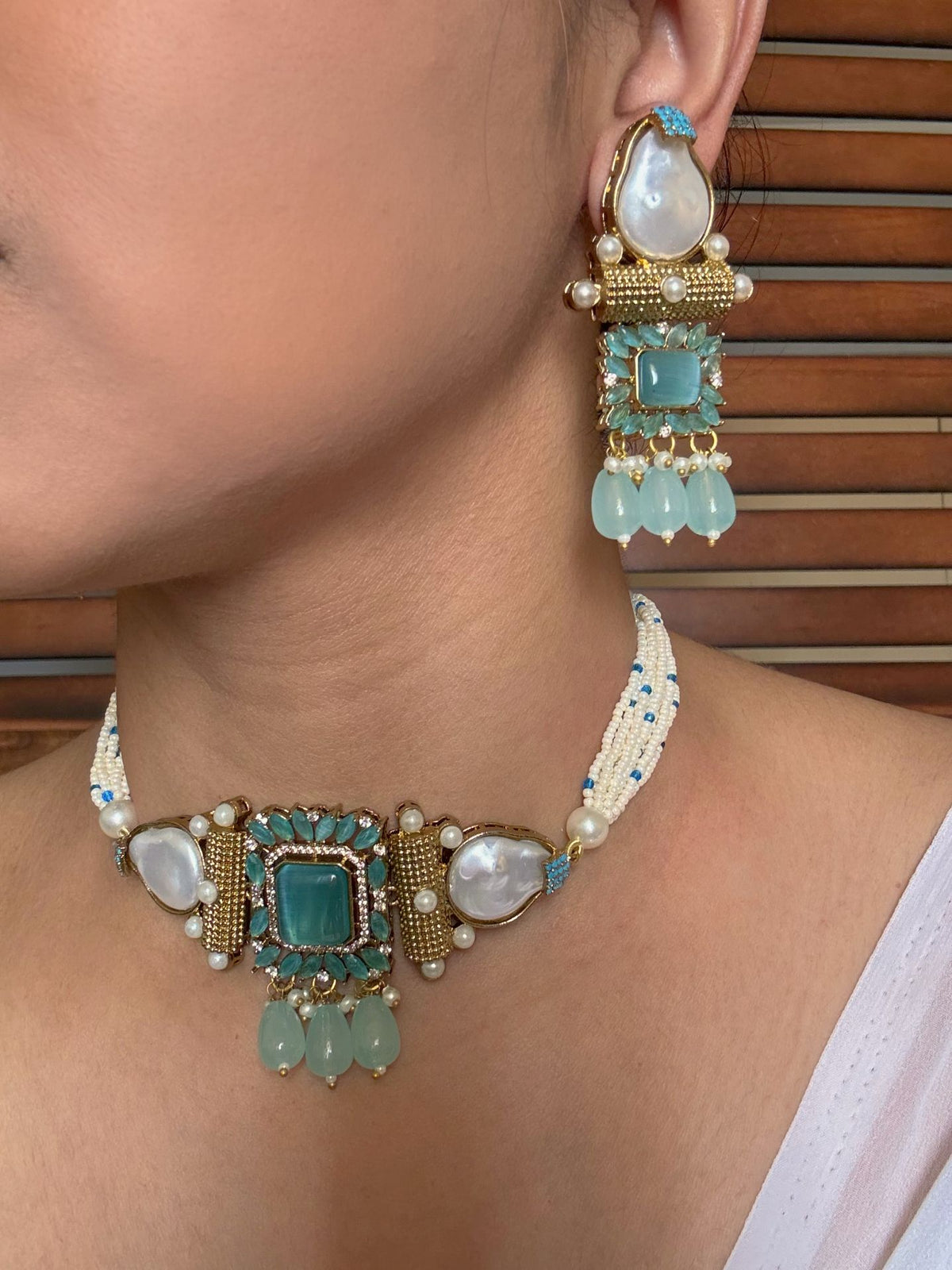 Buy Avya Statement Blue Stones Choker With Heavy Earrings online in India. Shop from an exclusive range of jewellery, AD necklace, Kundan necklace for weddings. -second