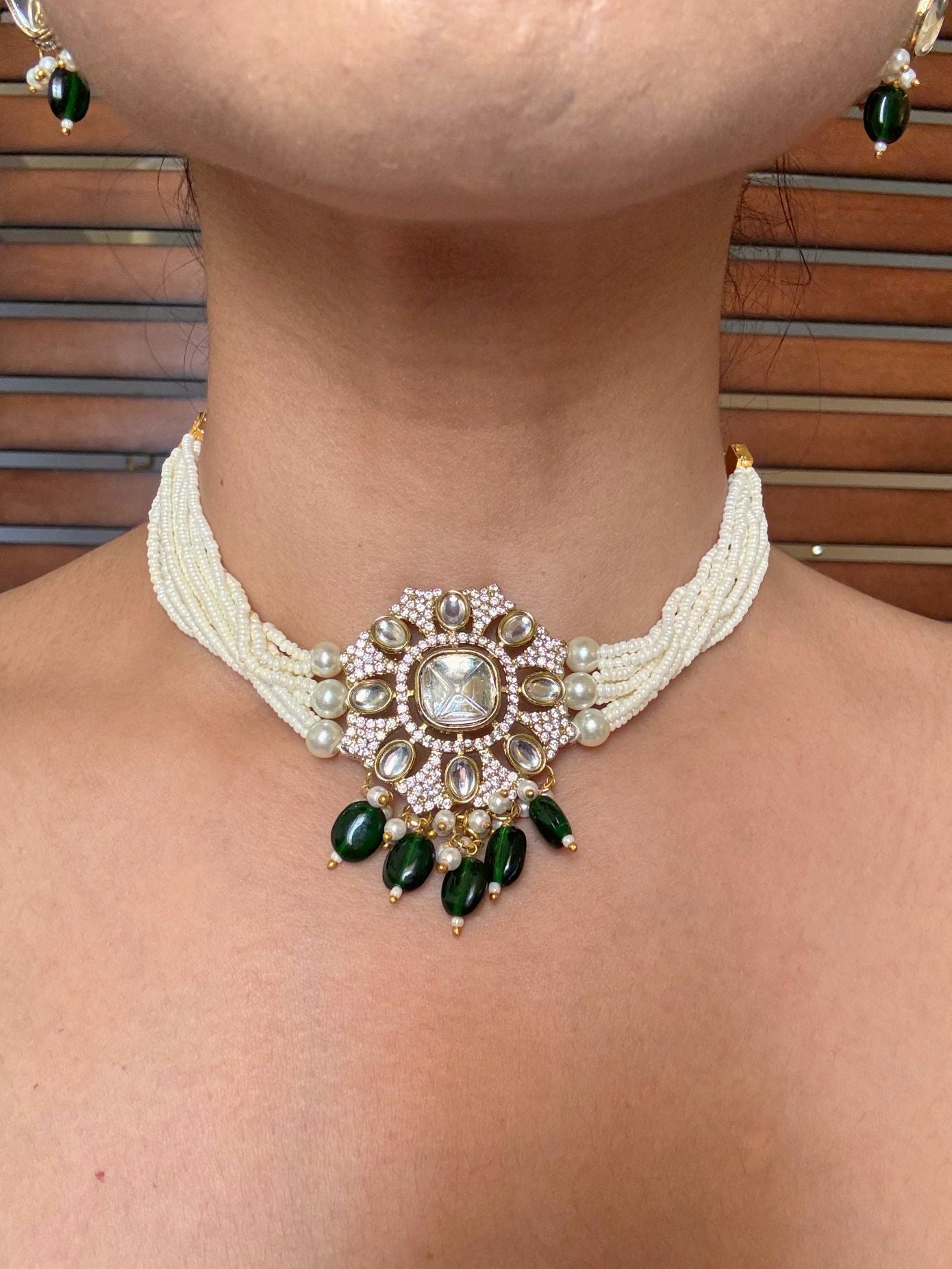 Buy Kaalki Statement Pearl Kundan Choker In Emerald Green online in India. Shop from an exclusive range of jewellery, AD necklace, Kundan necklace for weddings. -front