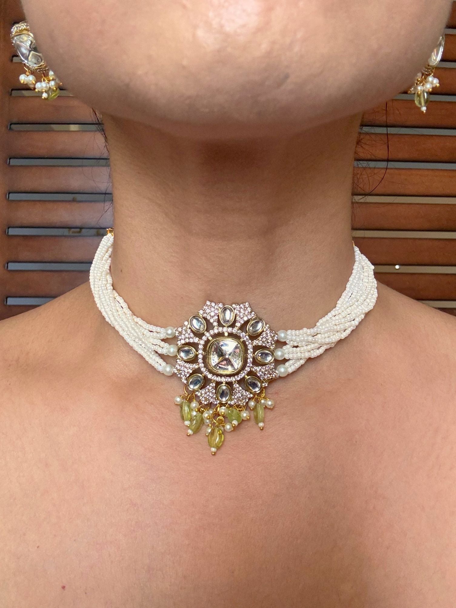 Buy Kaalki Statement Pearl Kundan Choker In Light Green online in India. Shop from an exclusive range of jewellery, AD necklace, Kundan necklace for weddings. -front