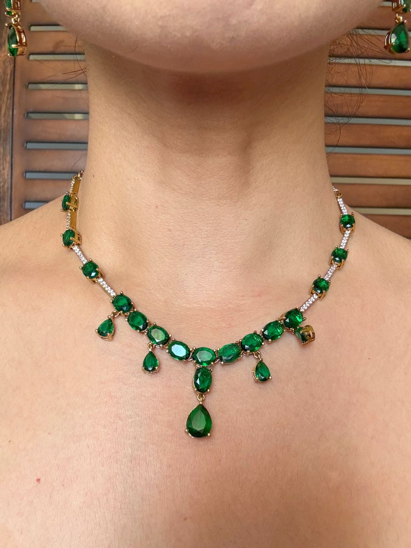 Buy Nimrat Elegant AD Necklace In Emerald Green online in India. Shop from an exclusive range of jewellery, AD necklace, Kundan necklace for weddings. -front
