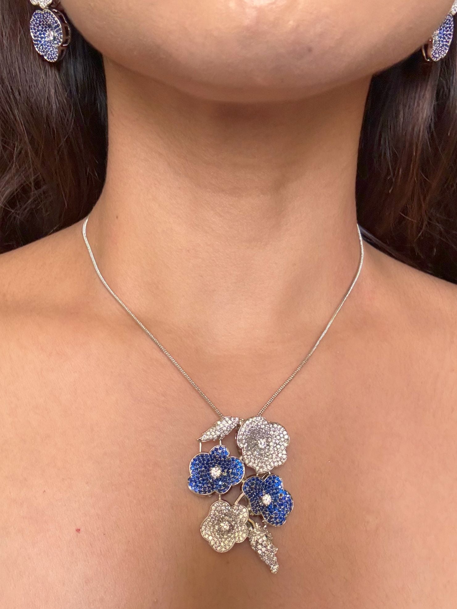 Shop  ILA Nano Setting Blue AD Pendant Set With Chain Online in India. Pendant sets in different stones like Kundan, Moissanite, CZ stones and AD stones. - First