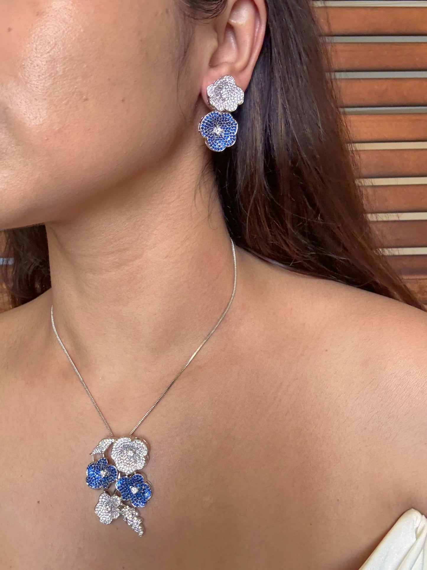 Shop  ILA Nano Setting Blue AD Pendant Set With Chain Online in India. Pendant sets in different stones like Kundan, Moissanite, CZ stones and AD stones. -side 